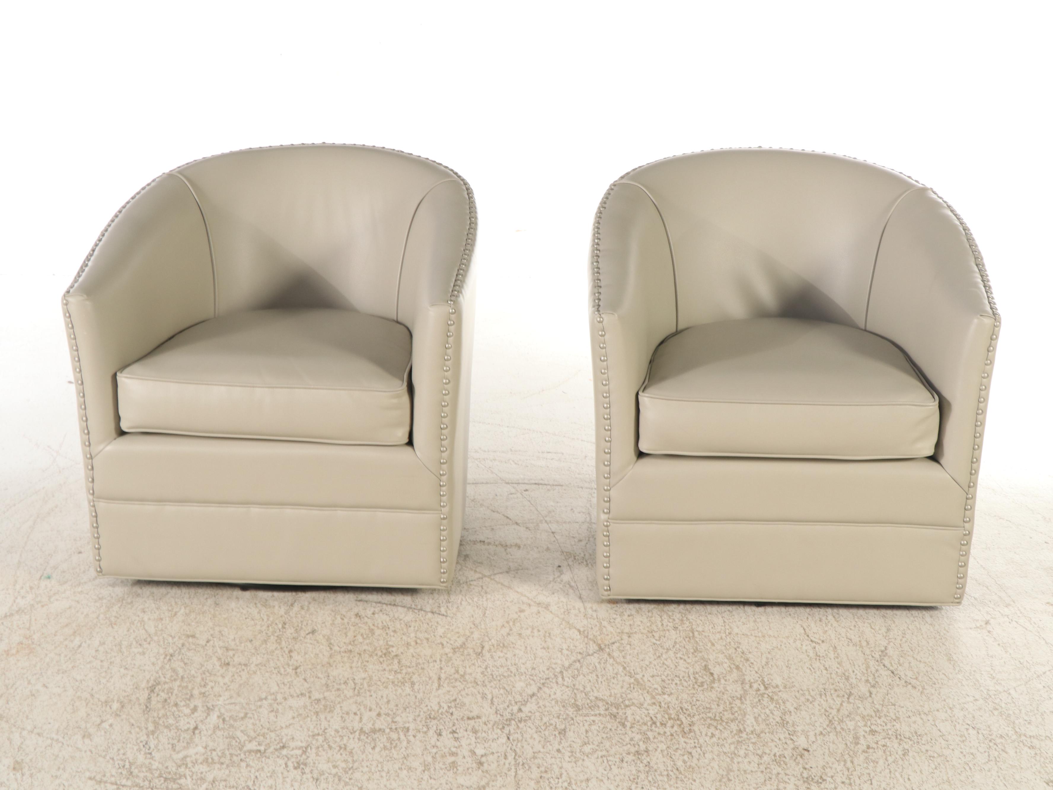 Pair of Modern Faux Leather Swivel Armchairs