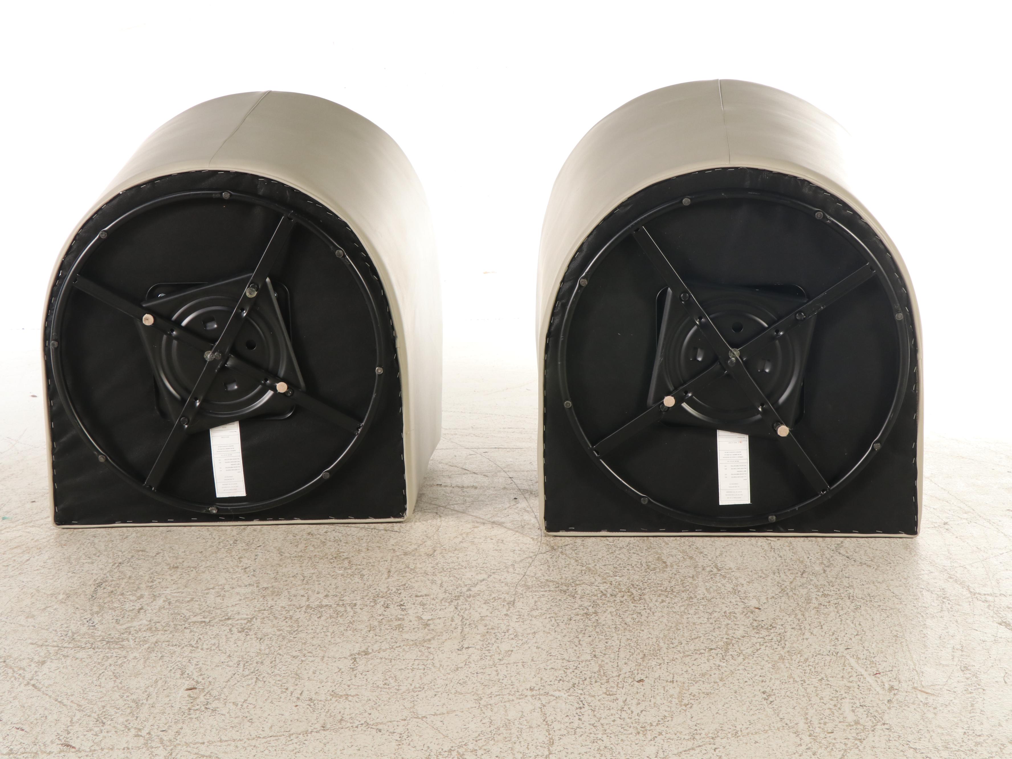 Pair of Modern Faux Leather Swivel Armchairs