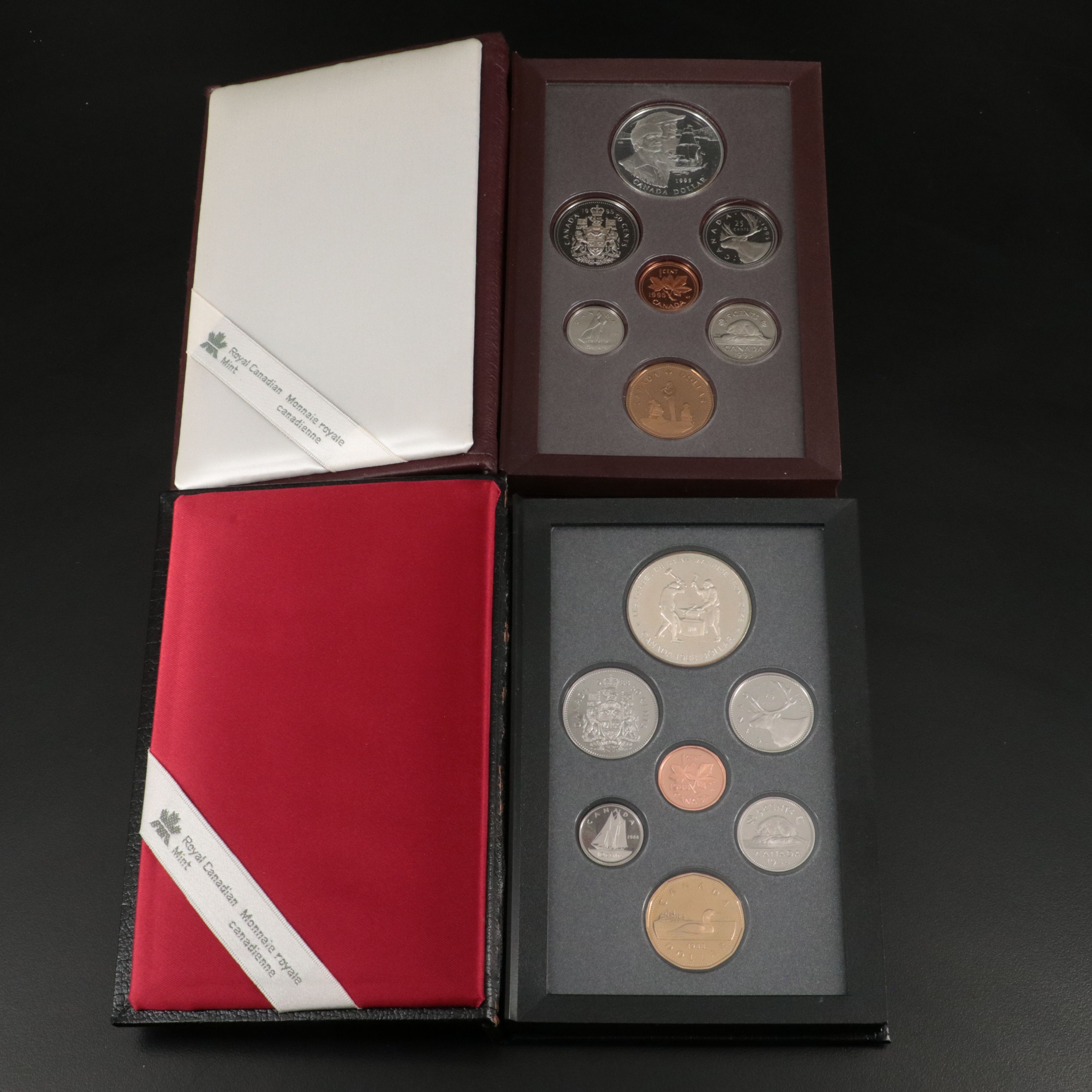 Two Canada Proof Sets, Each with a .925 Silver Dollar