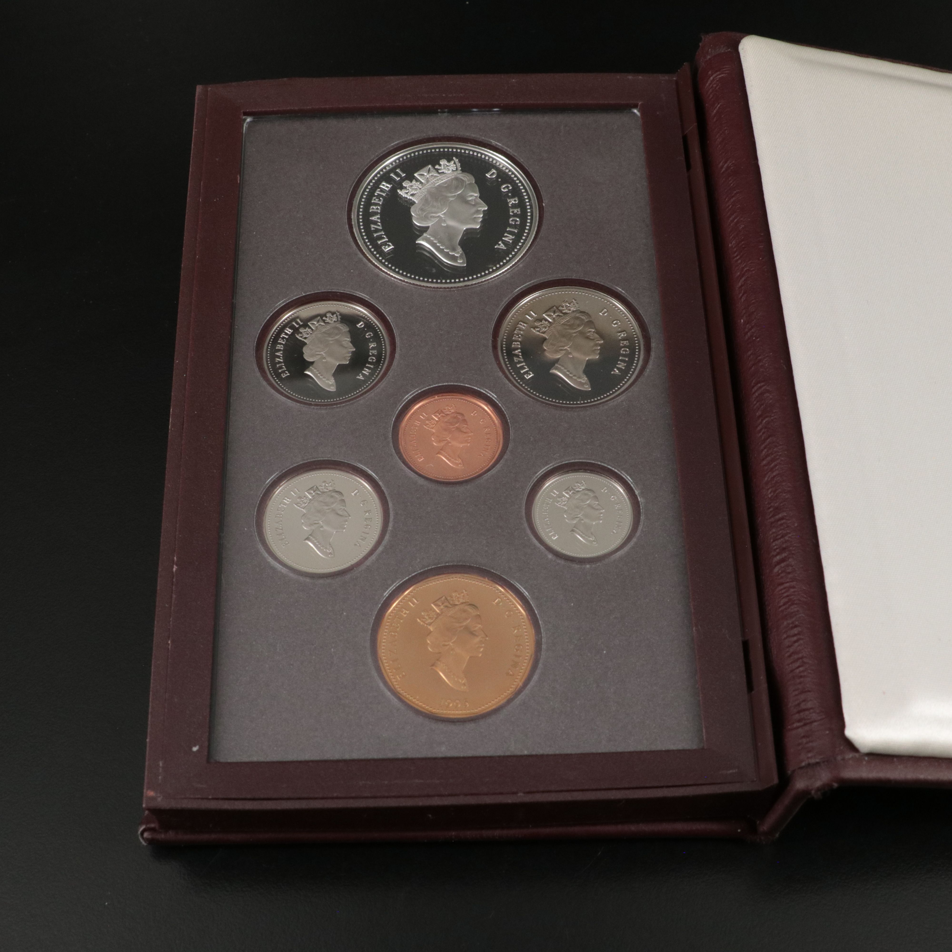 Two Canada Proof Sets, Each with a .925 Silver Dollar