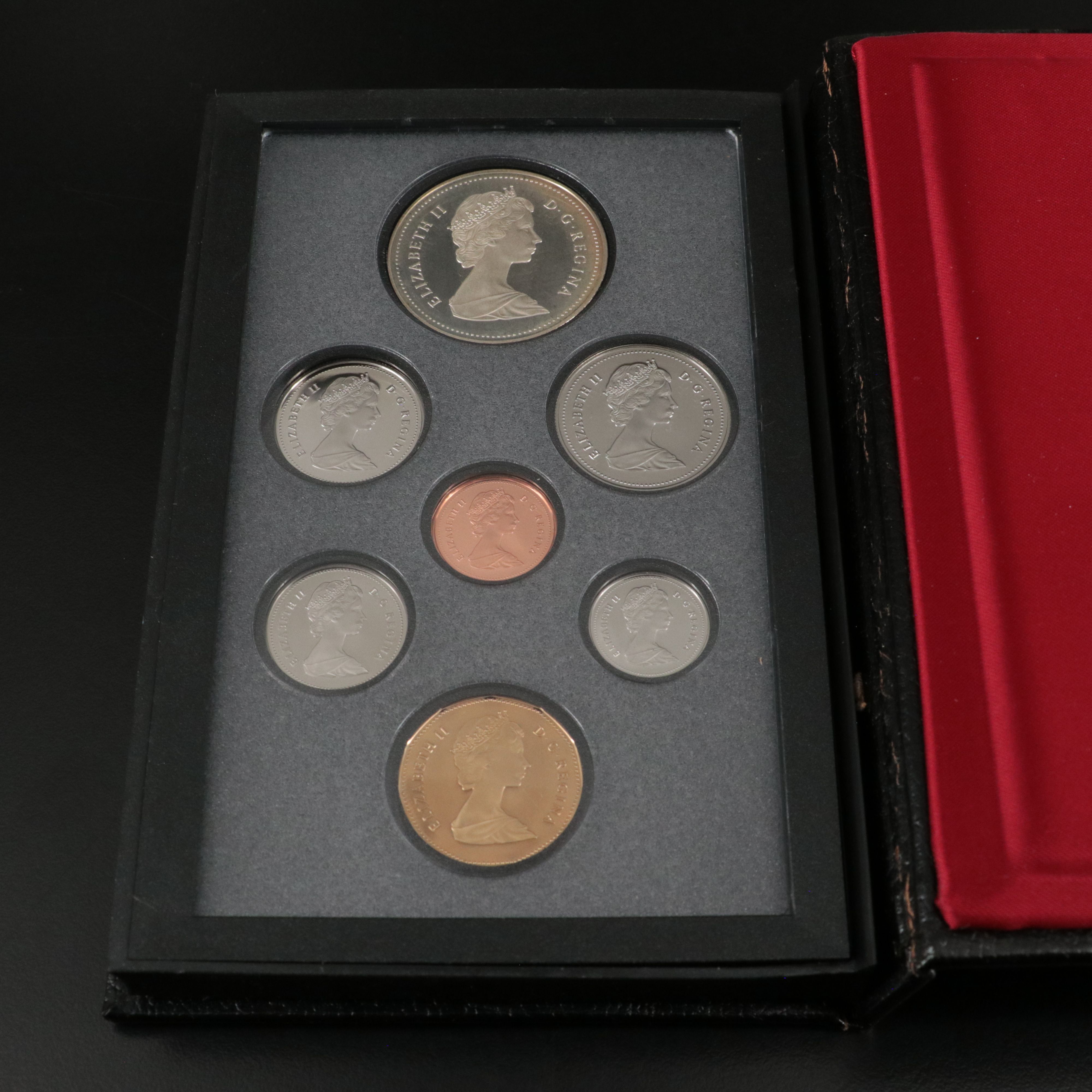 Two Canada Proof Sets, Each with a .925 Silver Dollar