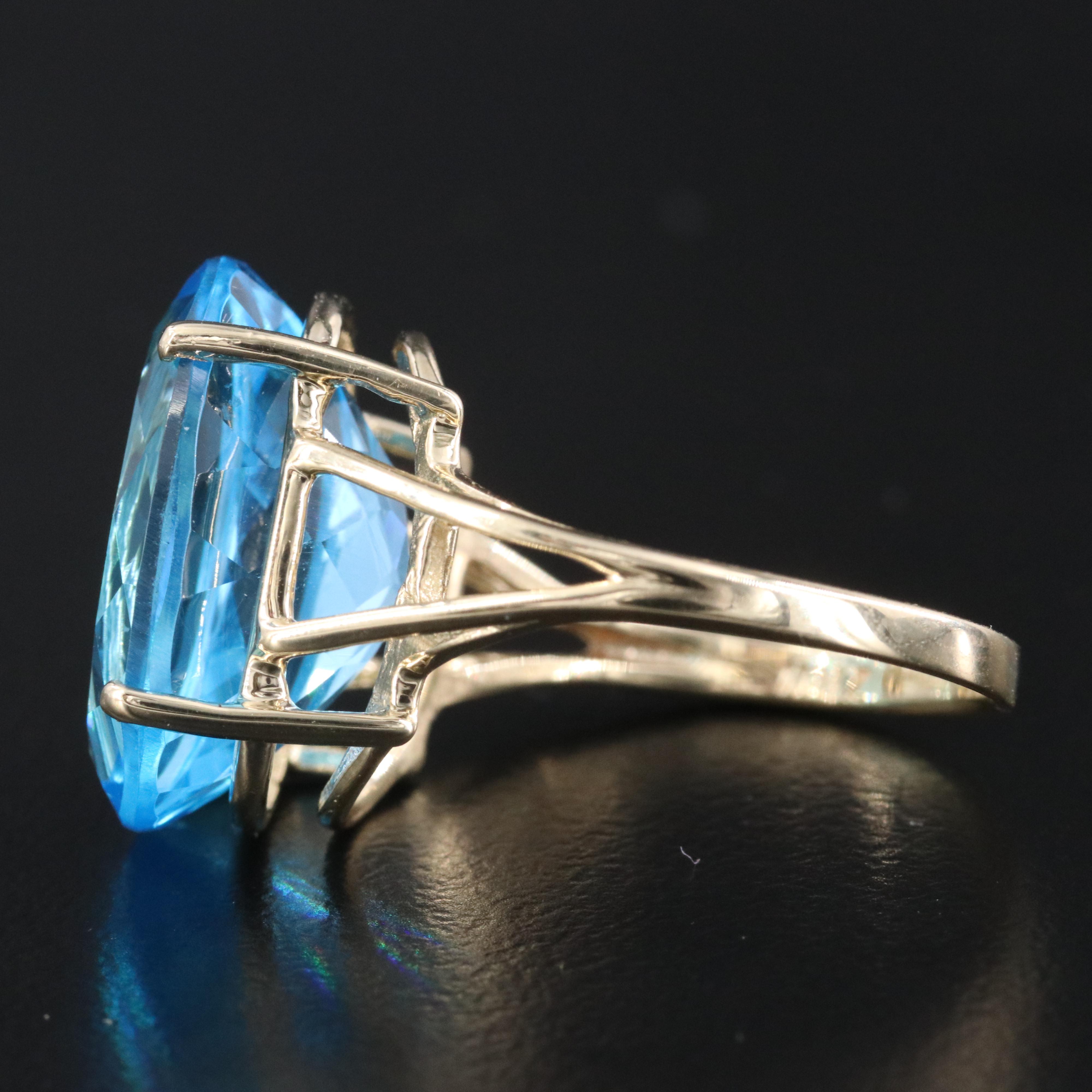 14K 10.33 CT Swiss Blue Topaz Ring