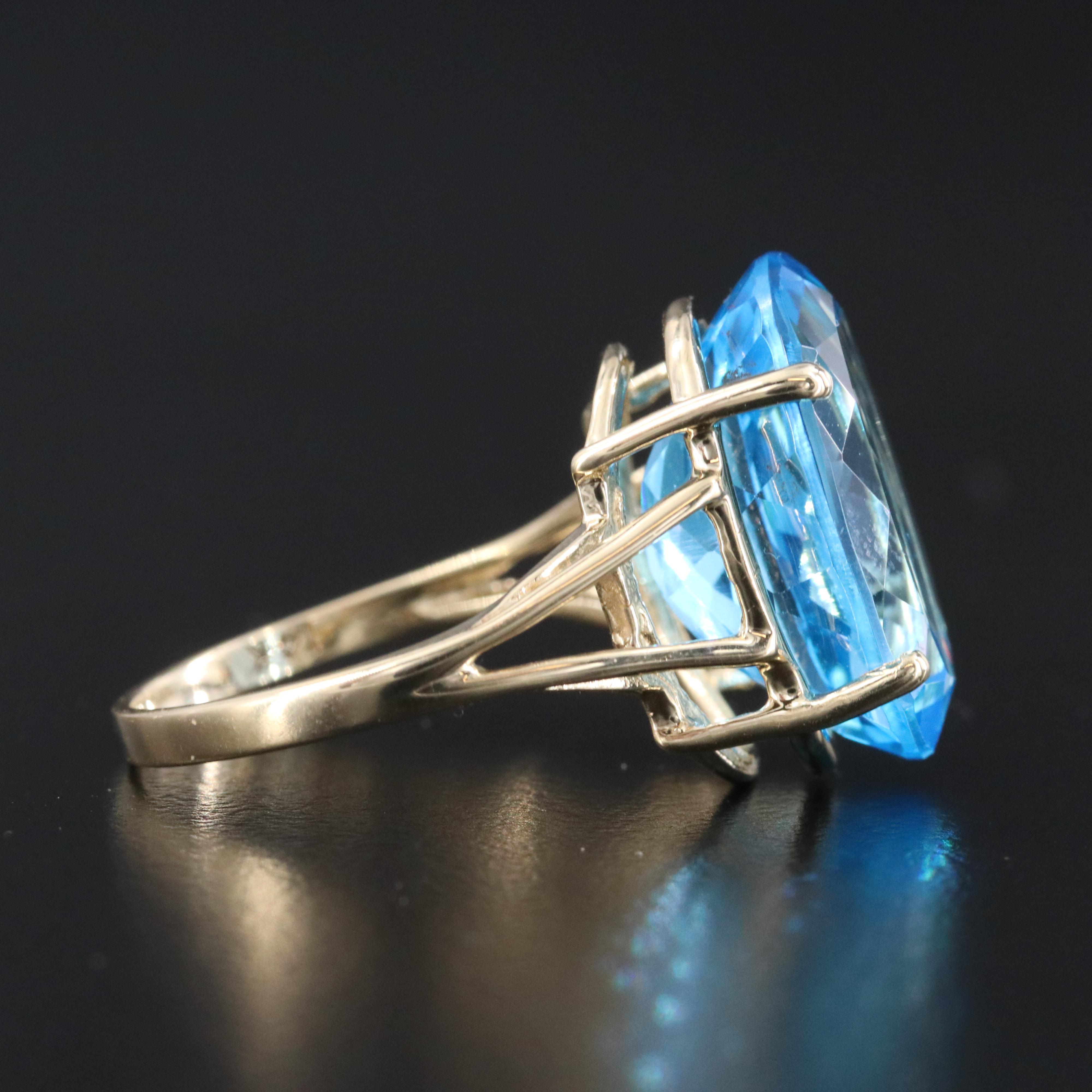 14K 10.33 CT Swiss Blue Topaz Ring