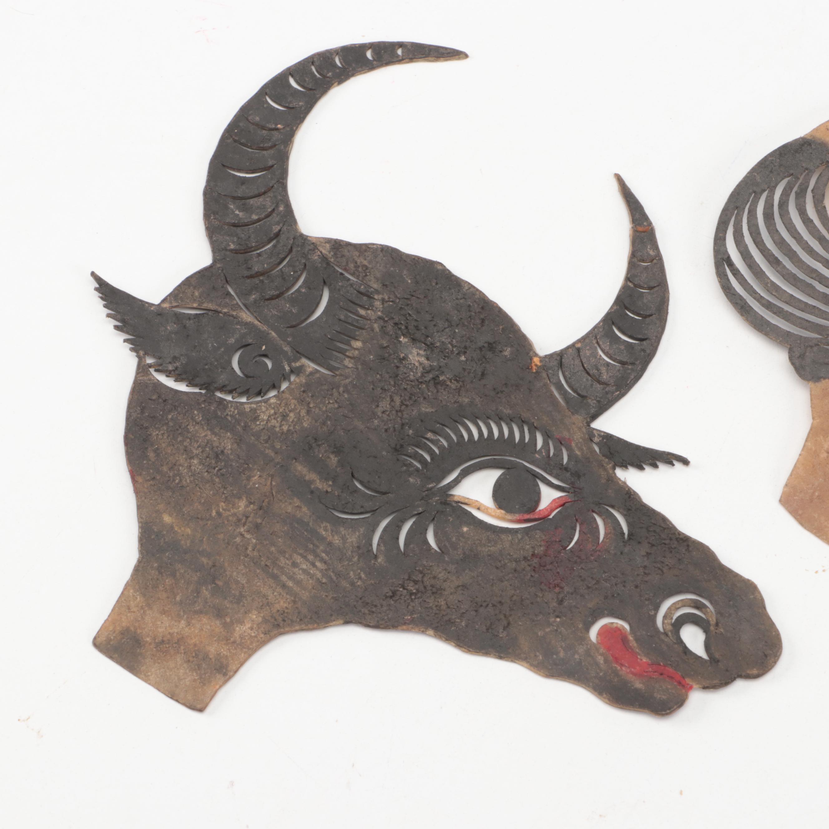 Chinese Bull and Wounded Man Painted Vellum Shadow Puppet Heads, Circa 1870