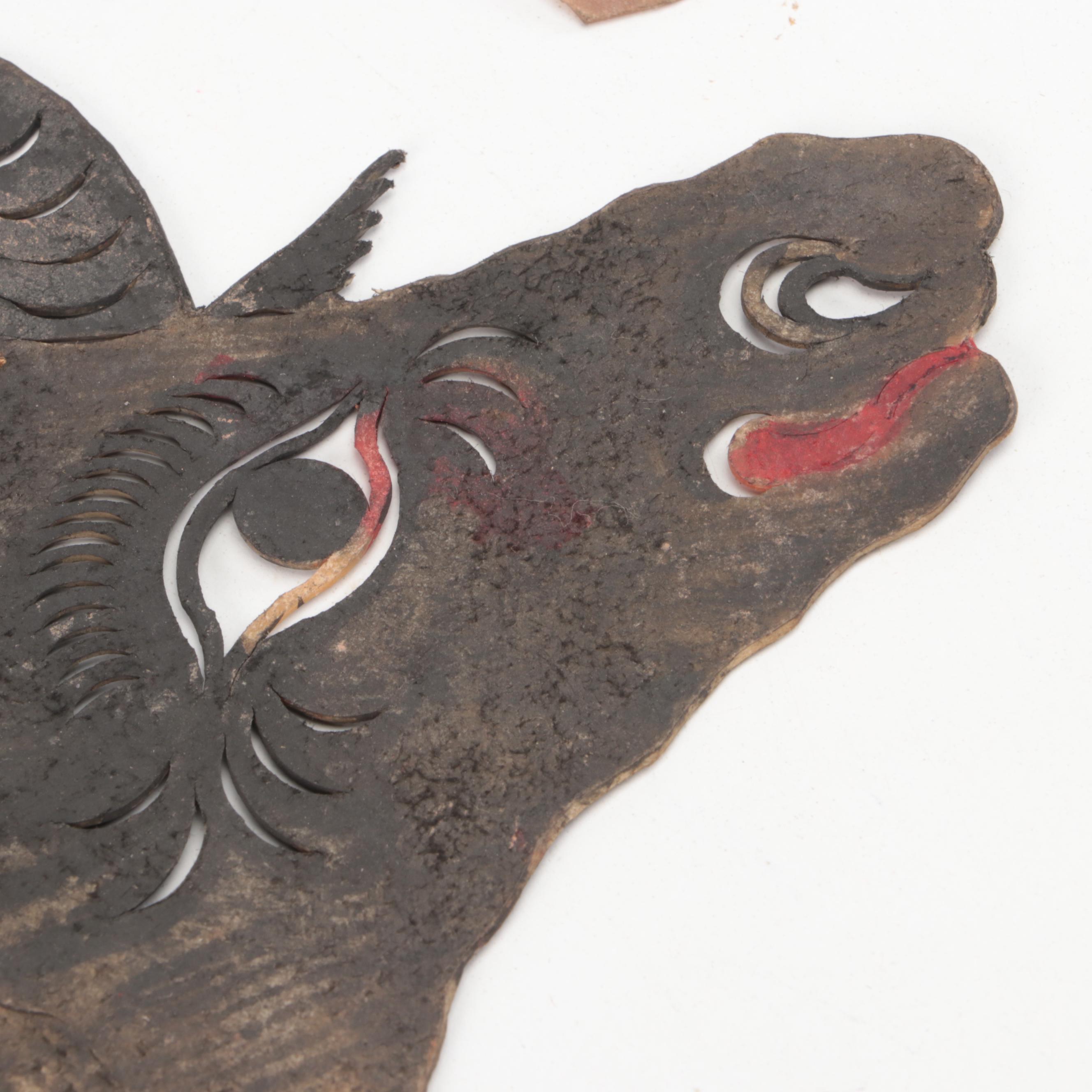 Chinese Bull and Wounded Man Painted Vellum Shadow Puppet Heads, Circa 1870