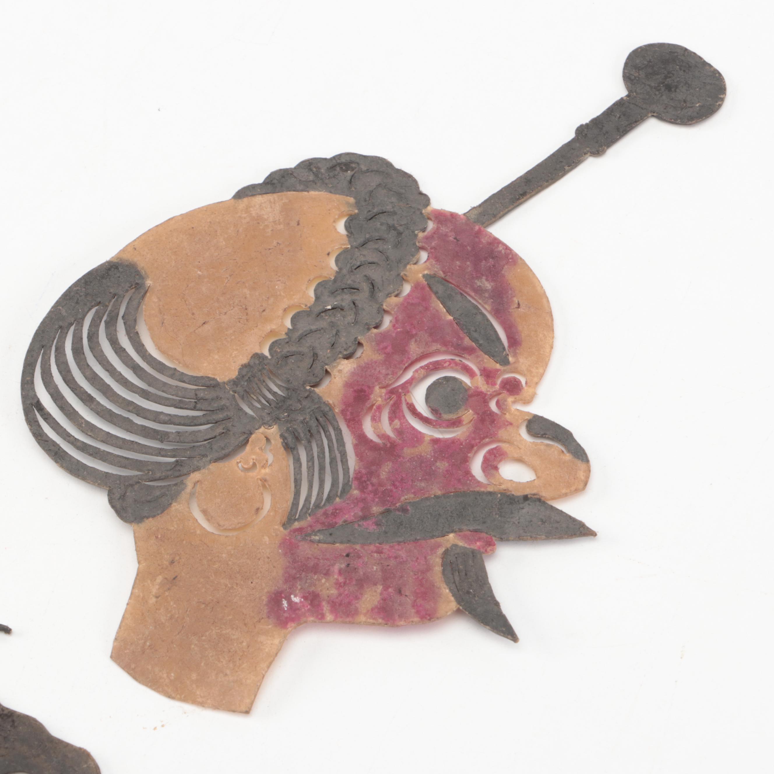 Chinese Bull and Wounded Man Painted Vellum Shadow Puppet Heads, Circa 1870