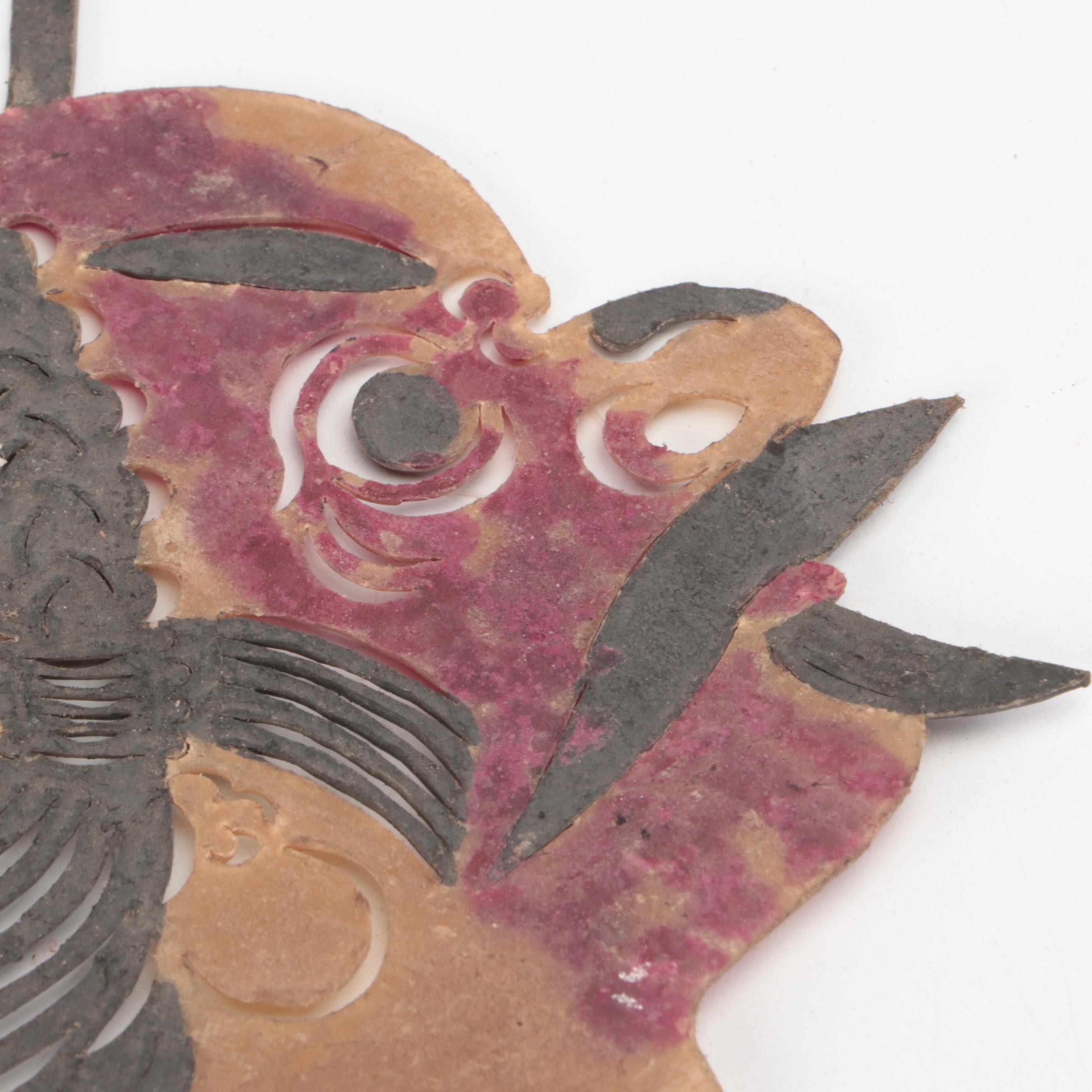 Chinese Bull and Wounded Man Painted Vellum Shadow Puppet Heads, Circa 1870