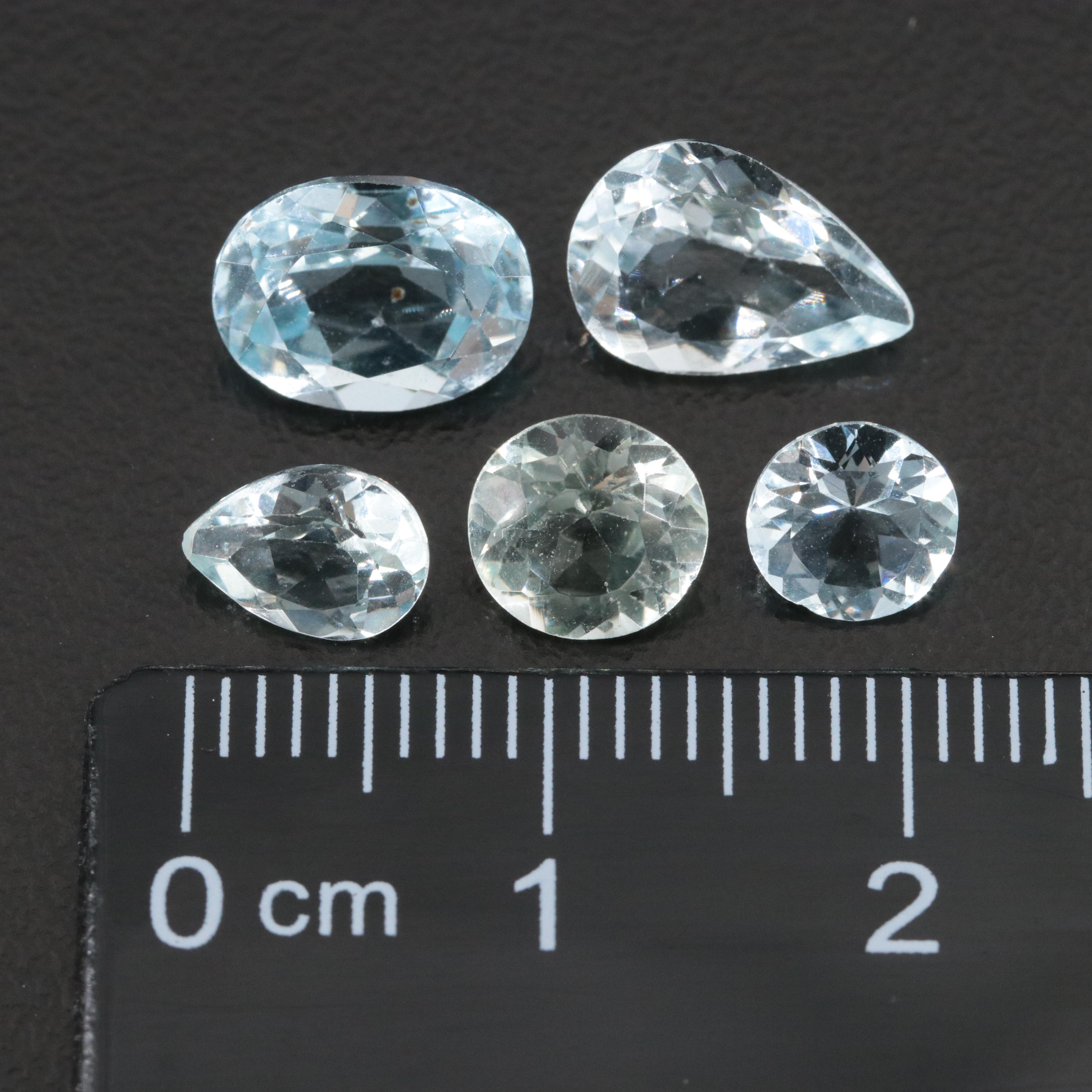 Loose 5.98 CTW Aquamarine and Topaz Lot