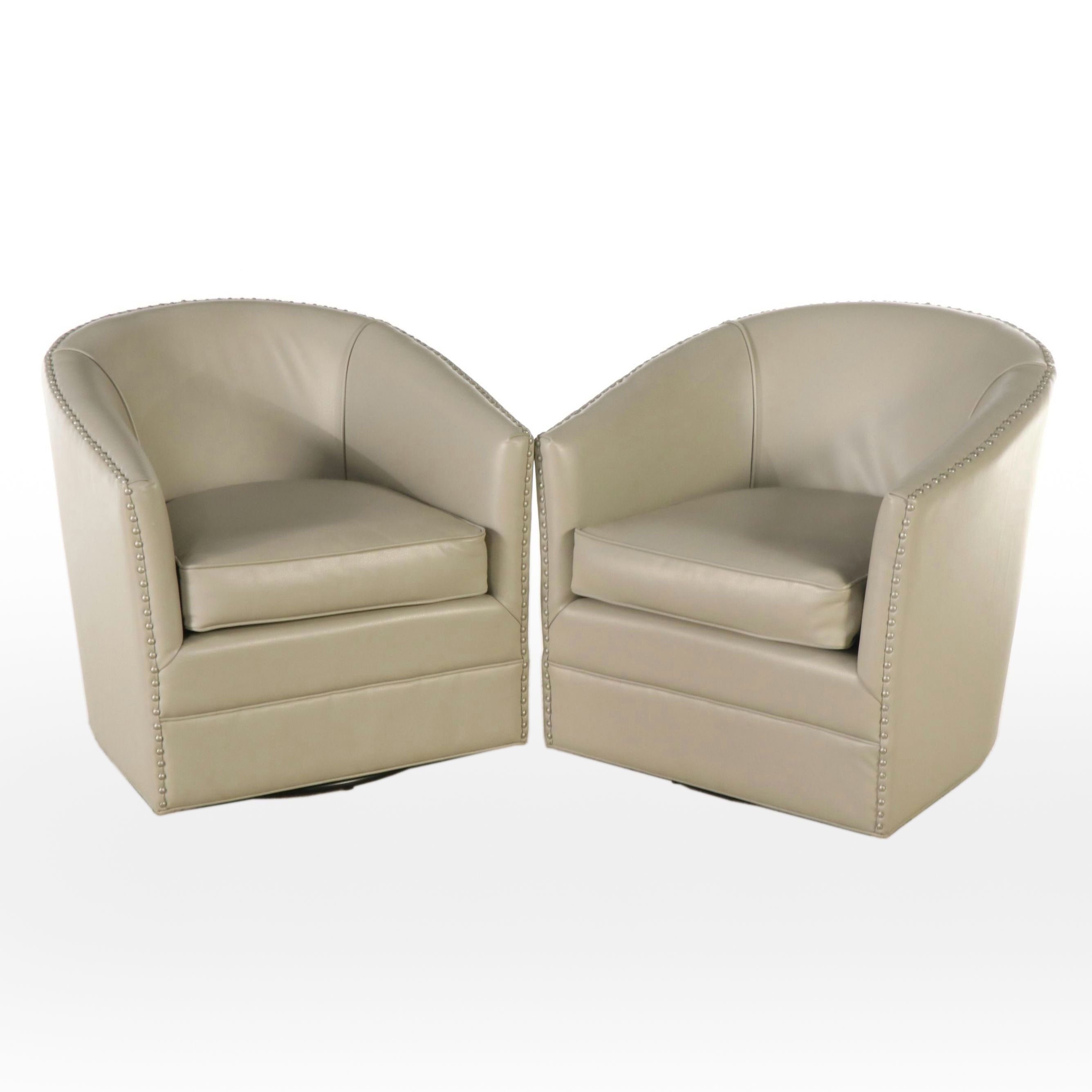 Pair of Modern Faux Leather Swivel Armchairs