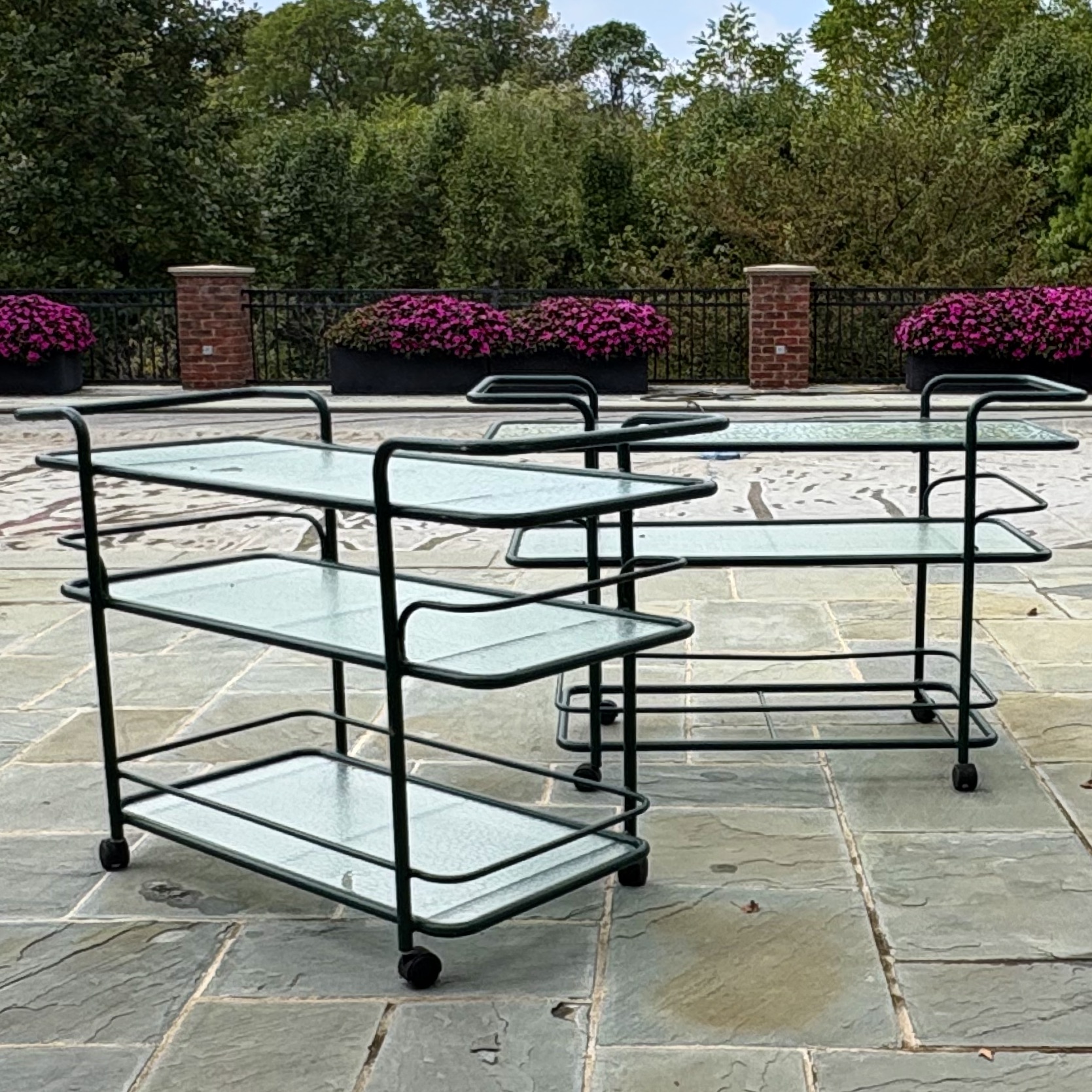 Pair of Hunter Green Tubular Metal Serving Carts with Textured Glass Shelves