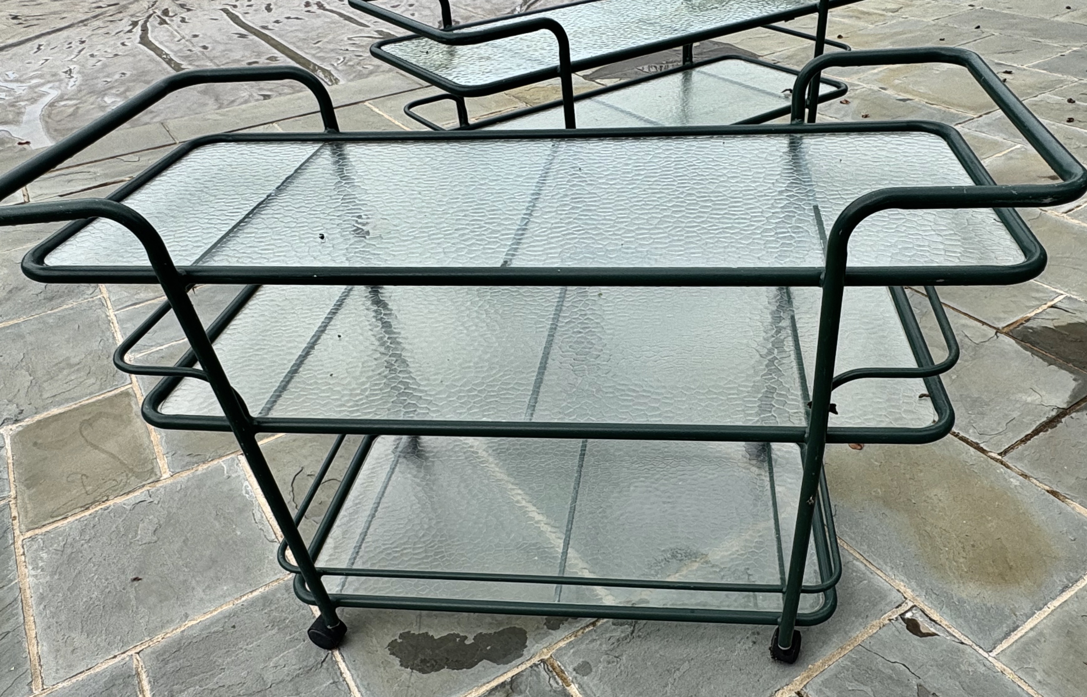 Pair of Hunter Green Tubular Metal Serving Carts with Textured Glass Shelves