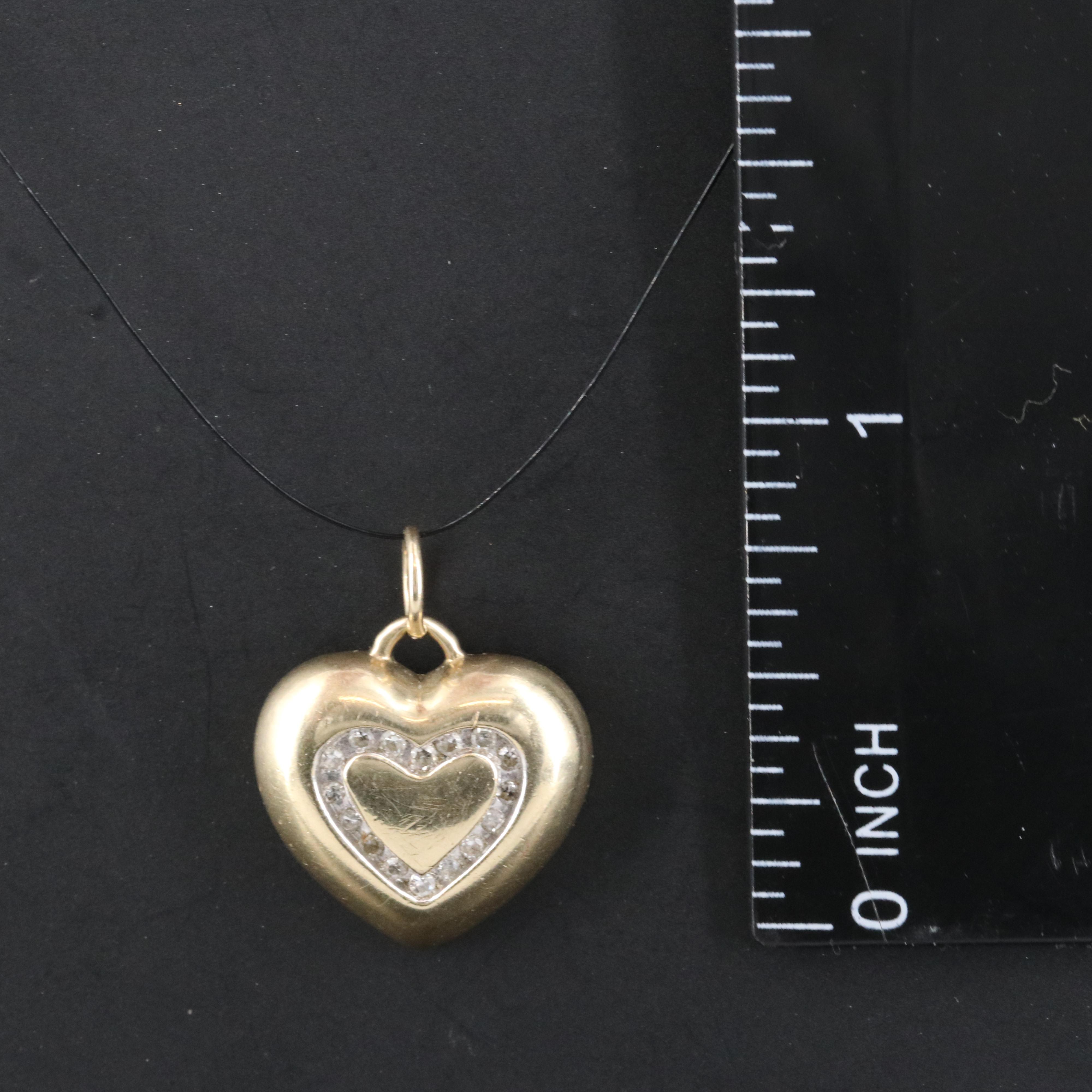 10K 0.12 CTW Diamond Heart Pendant