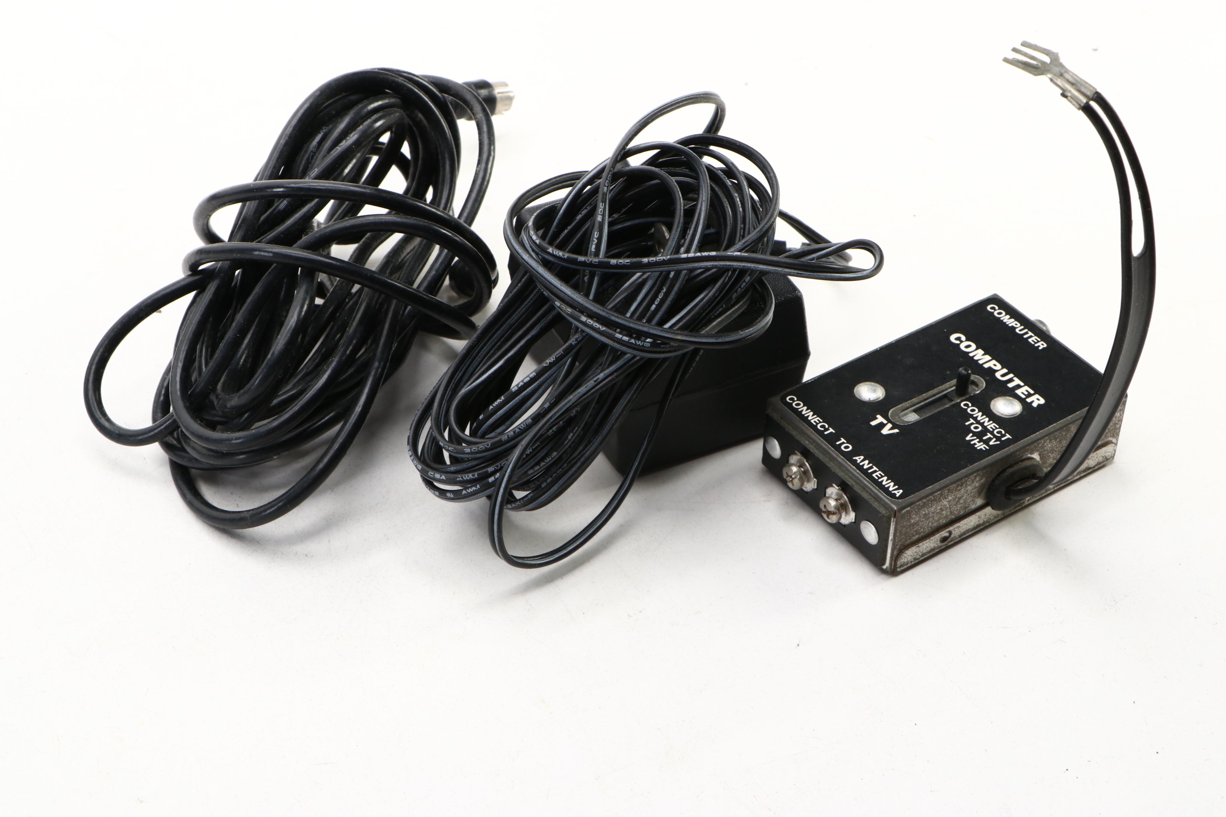 Atari 2600 Gaming Console with "Pac-Man," "Warlords," "Donkey Kong," More Games