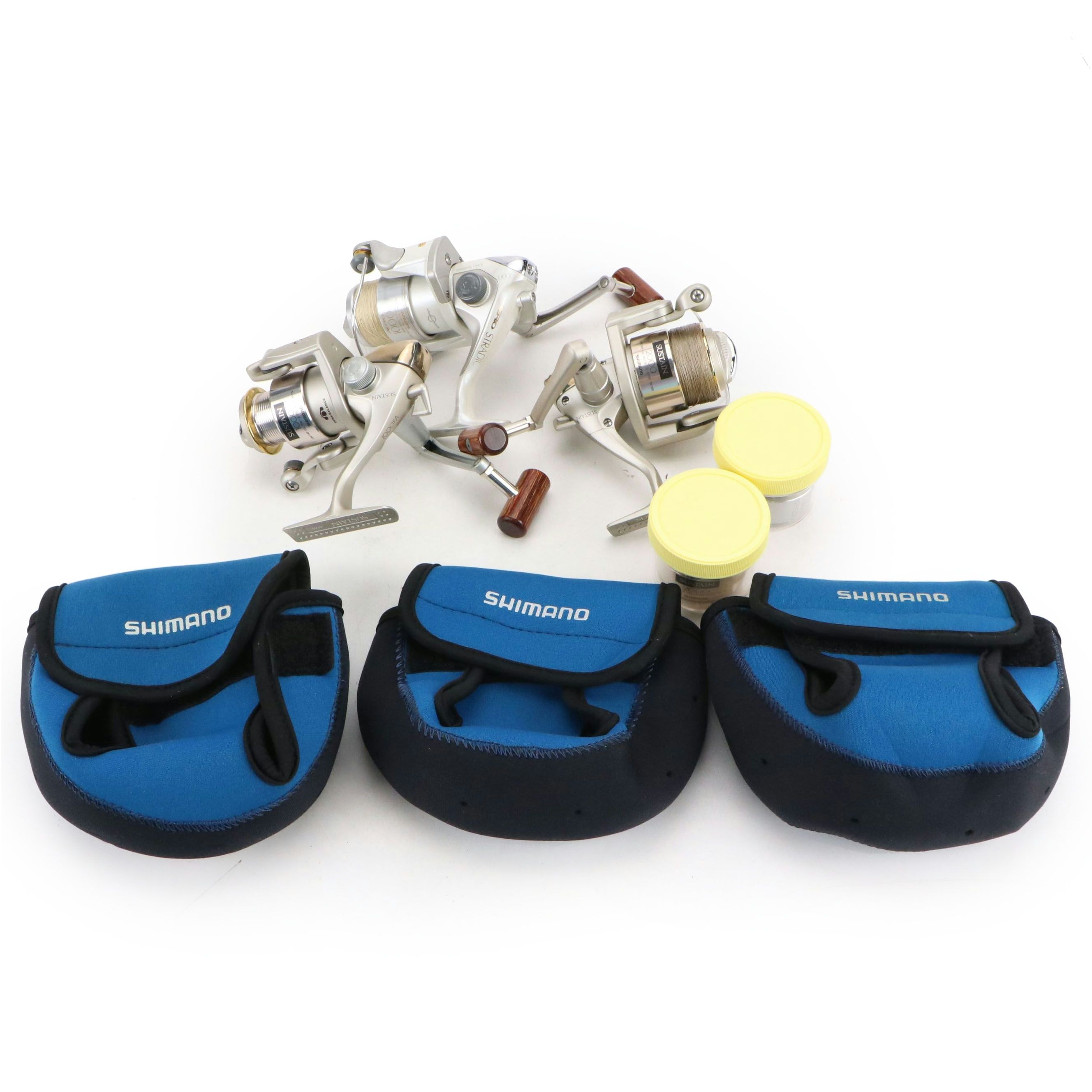 Shimano "Sustain" and "Aero" Spinning Reels with Cases