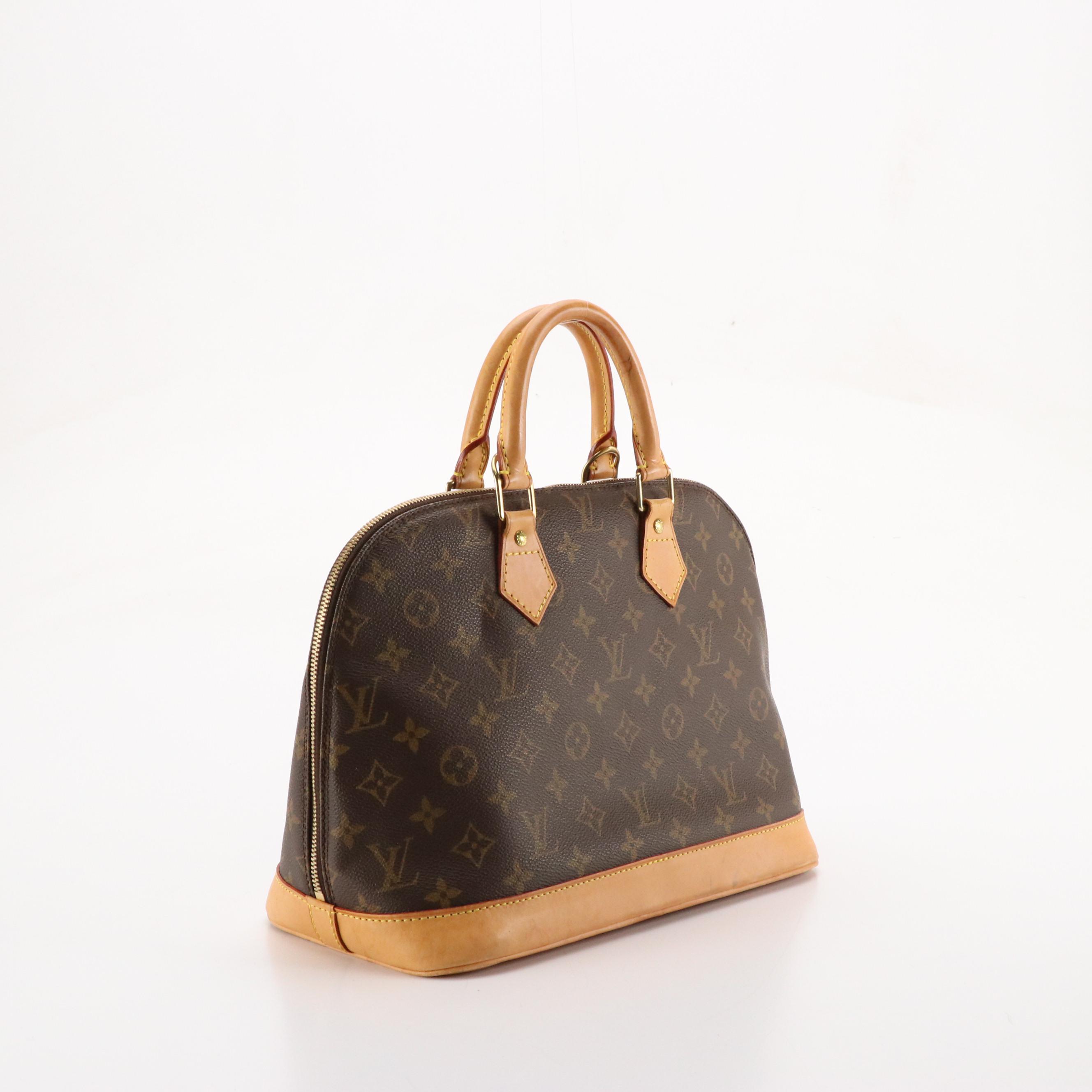 Louis Vuitton Alma PM Handbag in Monogram Canvas and Leather Trim