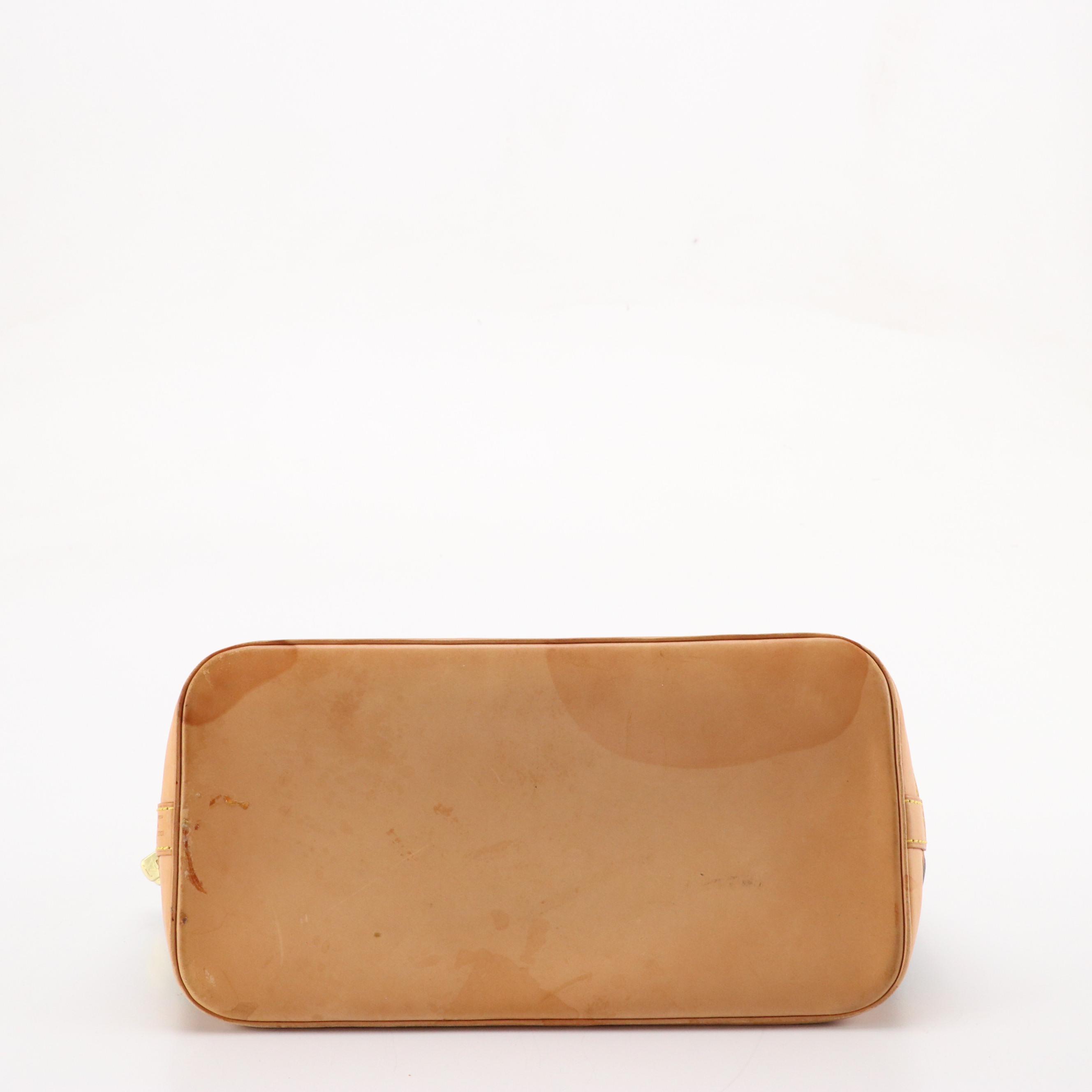 Louis Vuitton Alma PM Handbag in Monogram Canvas and Leather Trim