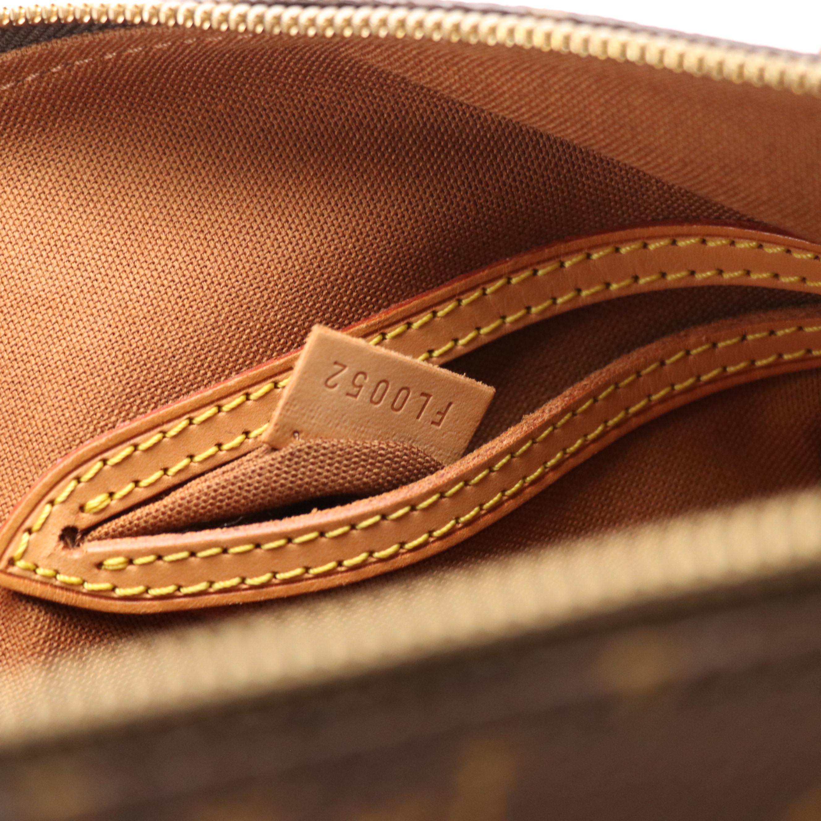 Louis Vuitton Alma PM Handbag in Monogram Canvas and Leather Trim