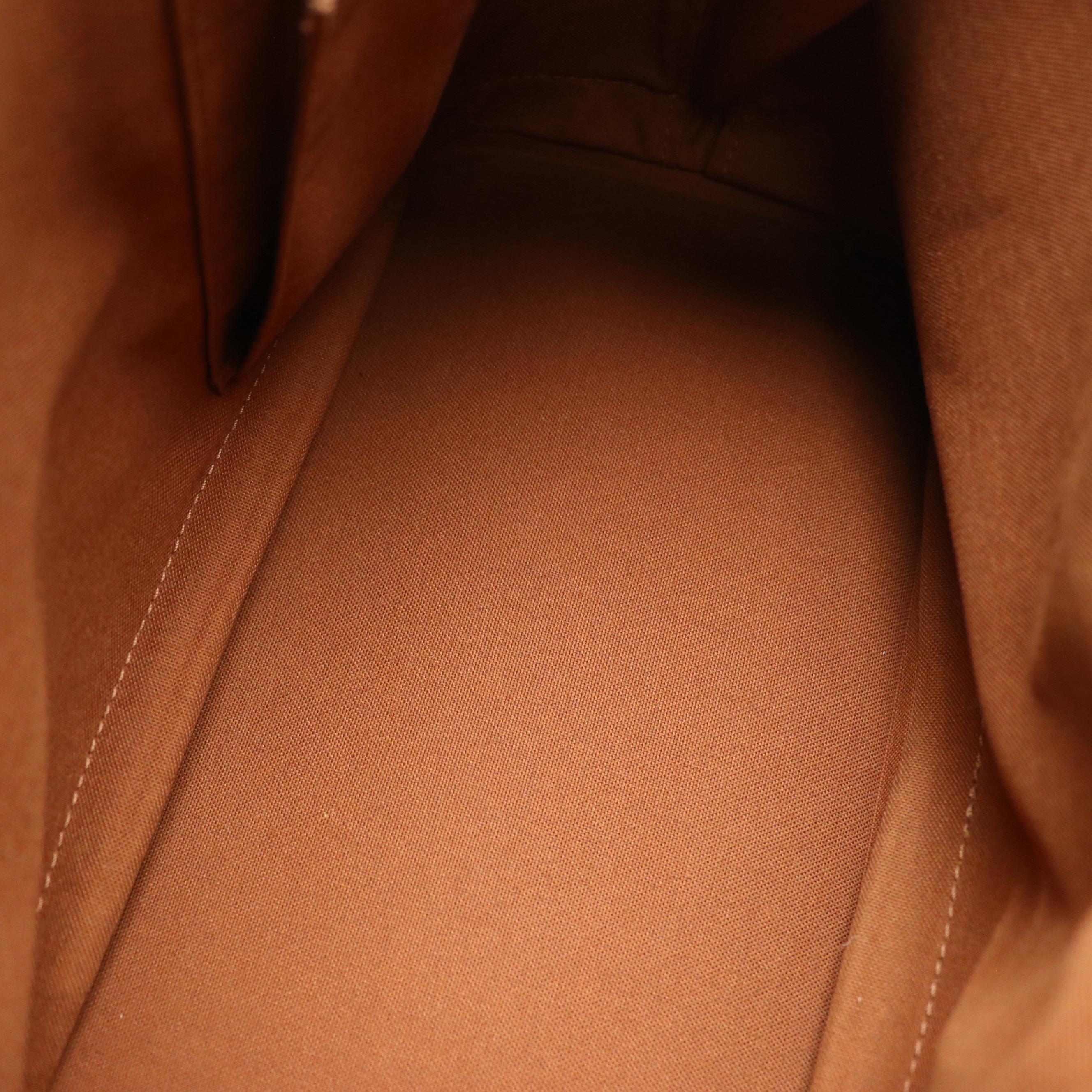 Louis Vuitton Alma PM Handbag in Monogram Canvas and Leather Trim