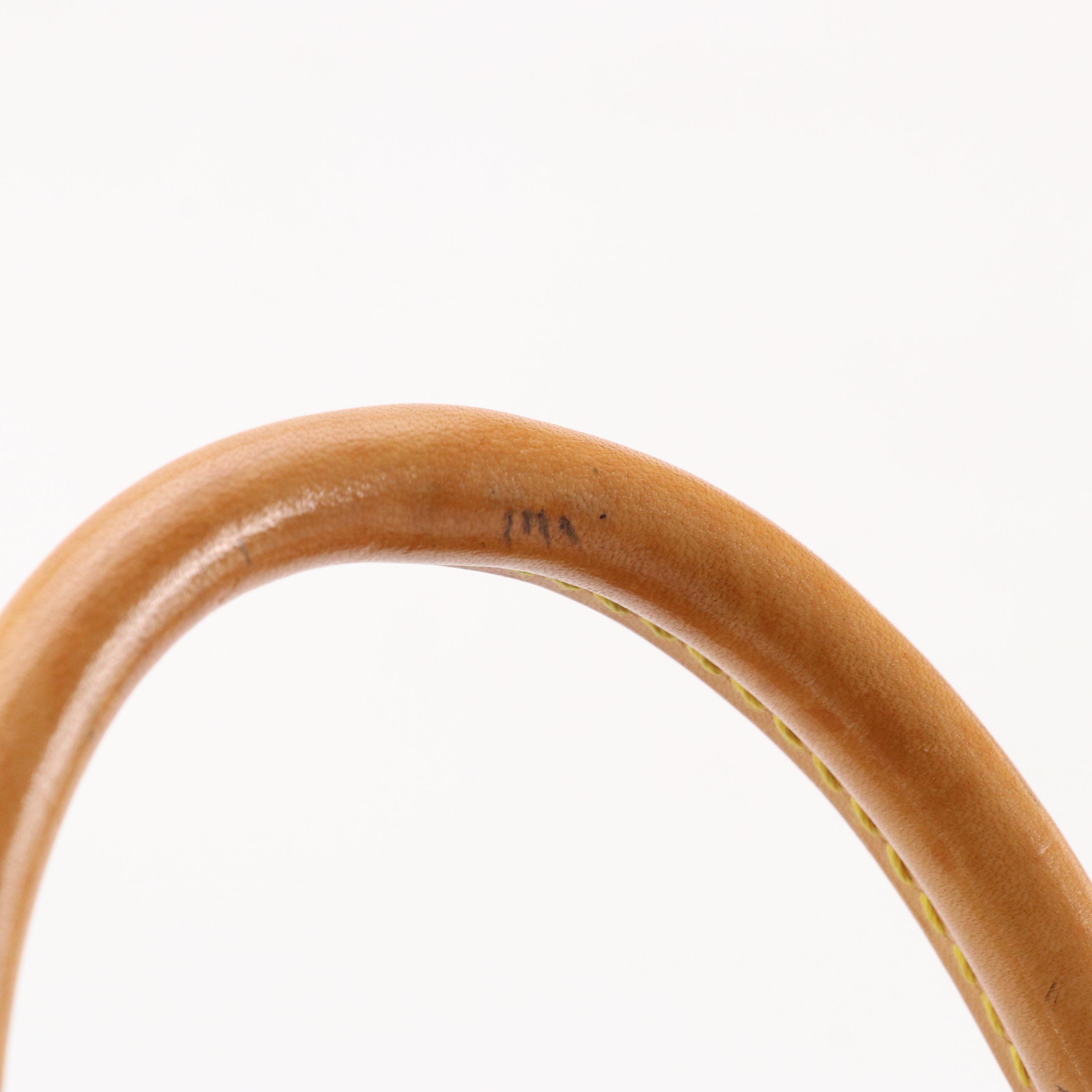 Louis Vuitton Alma PM Handbag in Monogram Canvas and Leather Trim