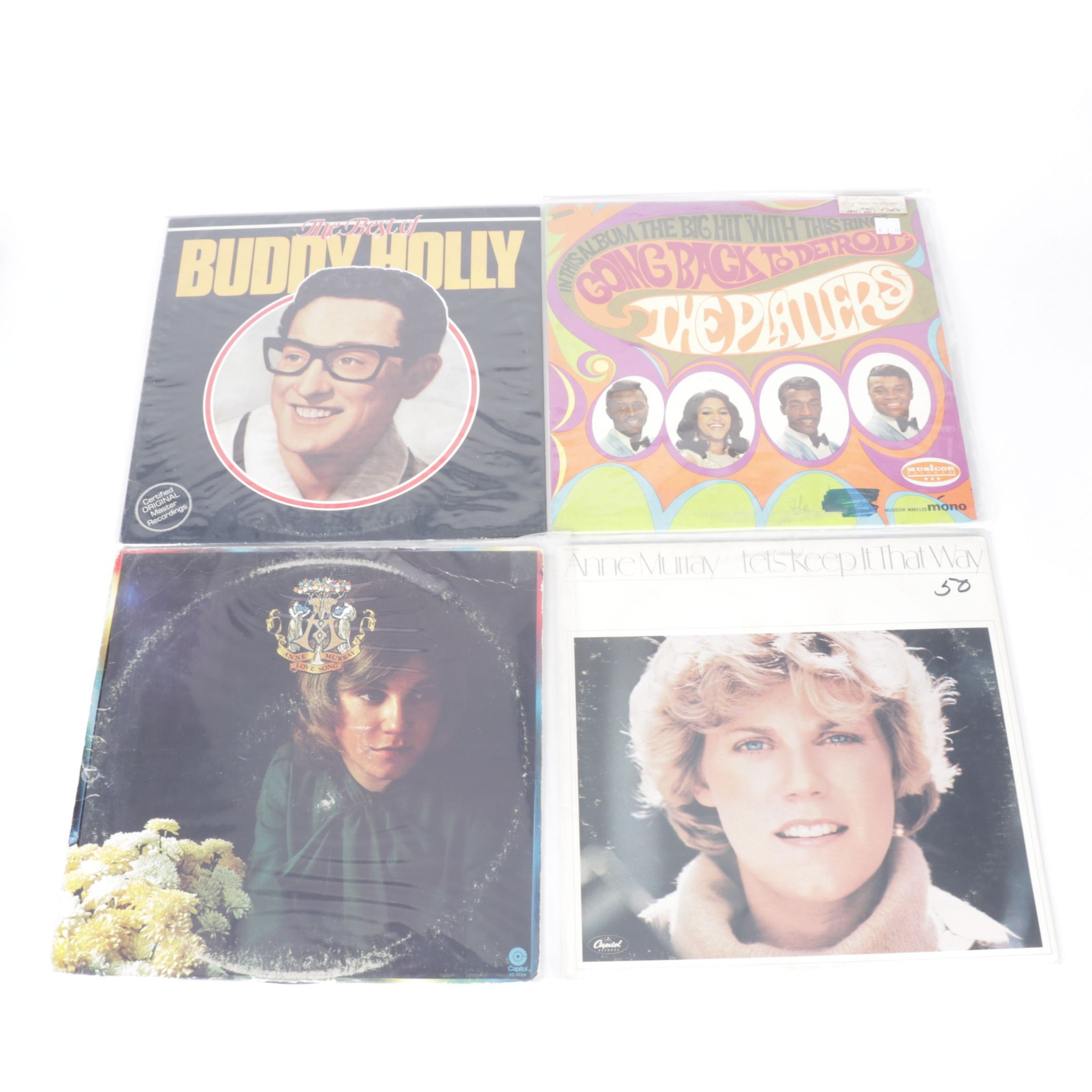 Elvis, Chuck Berry, Chubby Checker, Buddy Holly, and More Records