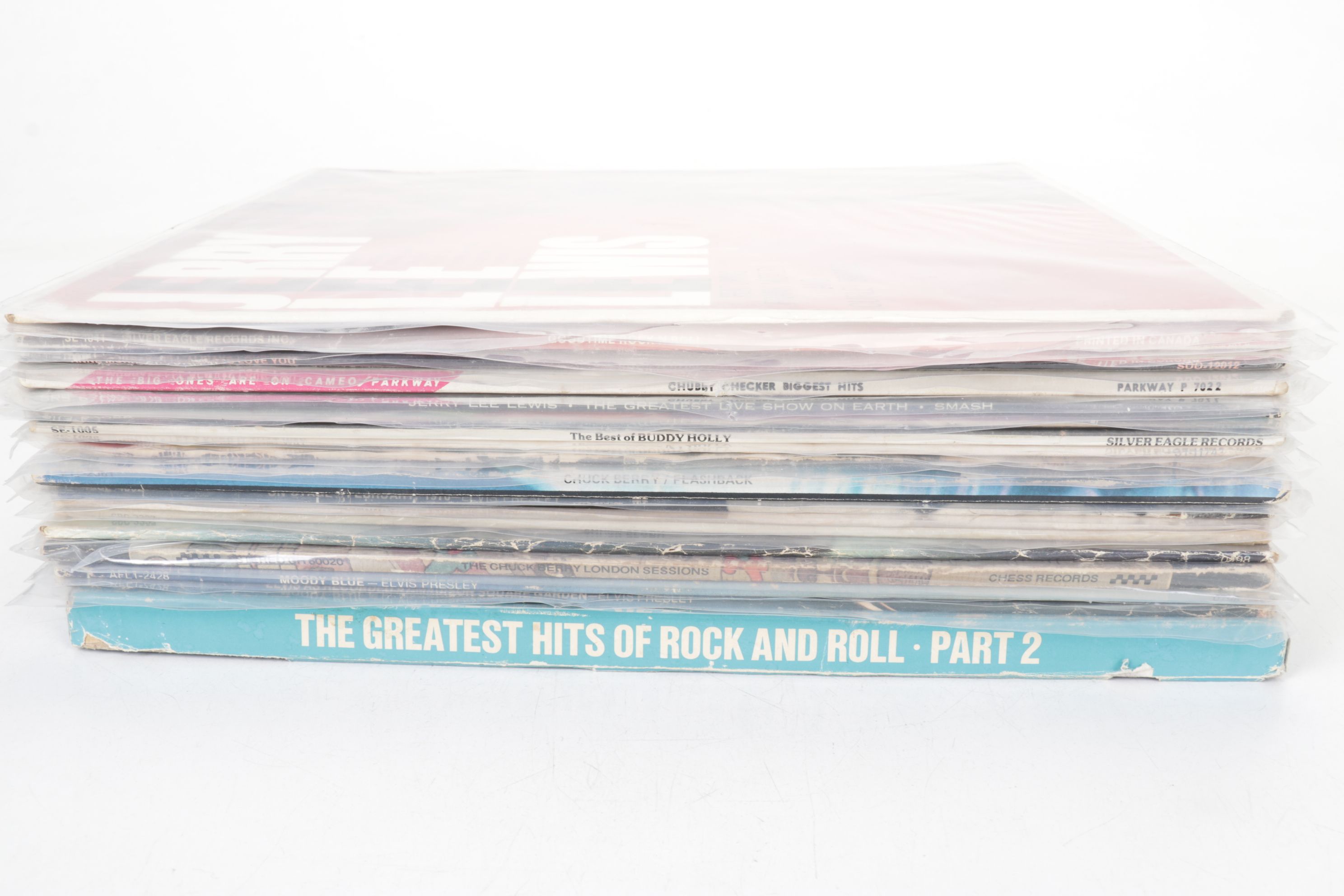 Elvis, Chuck Berry, Chubby Checker, Buddy Holly, and More Records