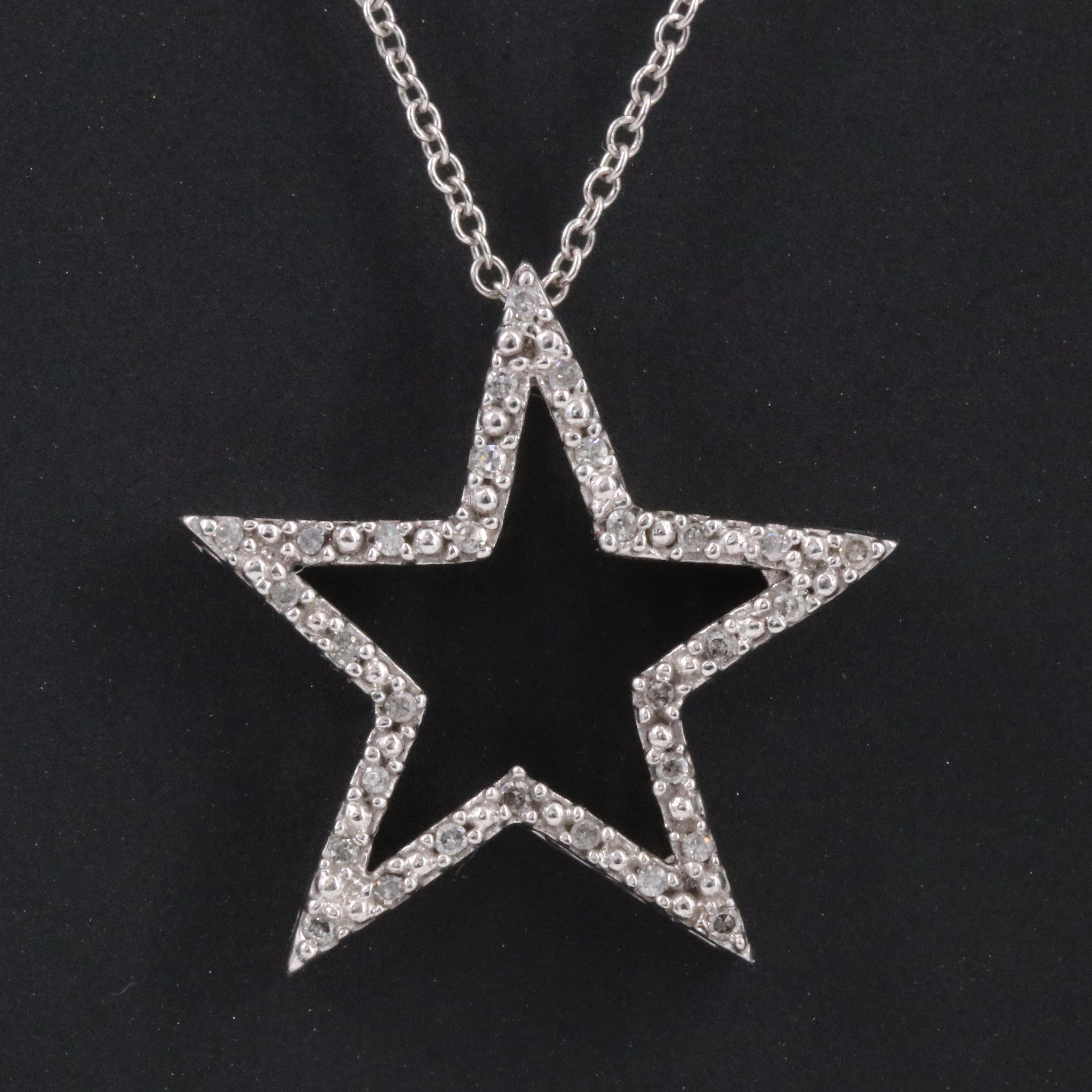 10K 0.11 CTW Diamond Star Pendant on 14K Chain Necklace