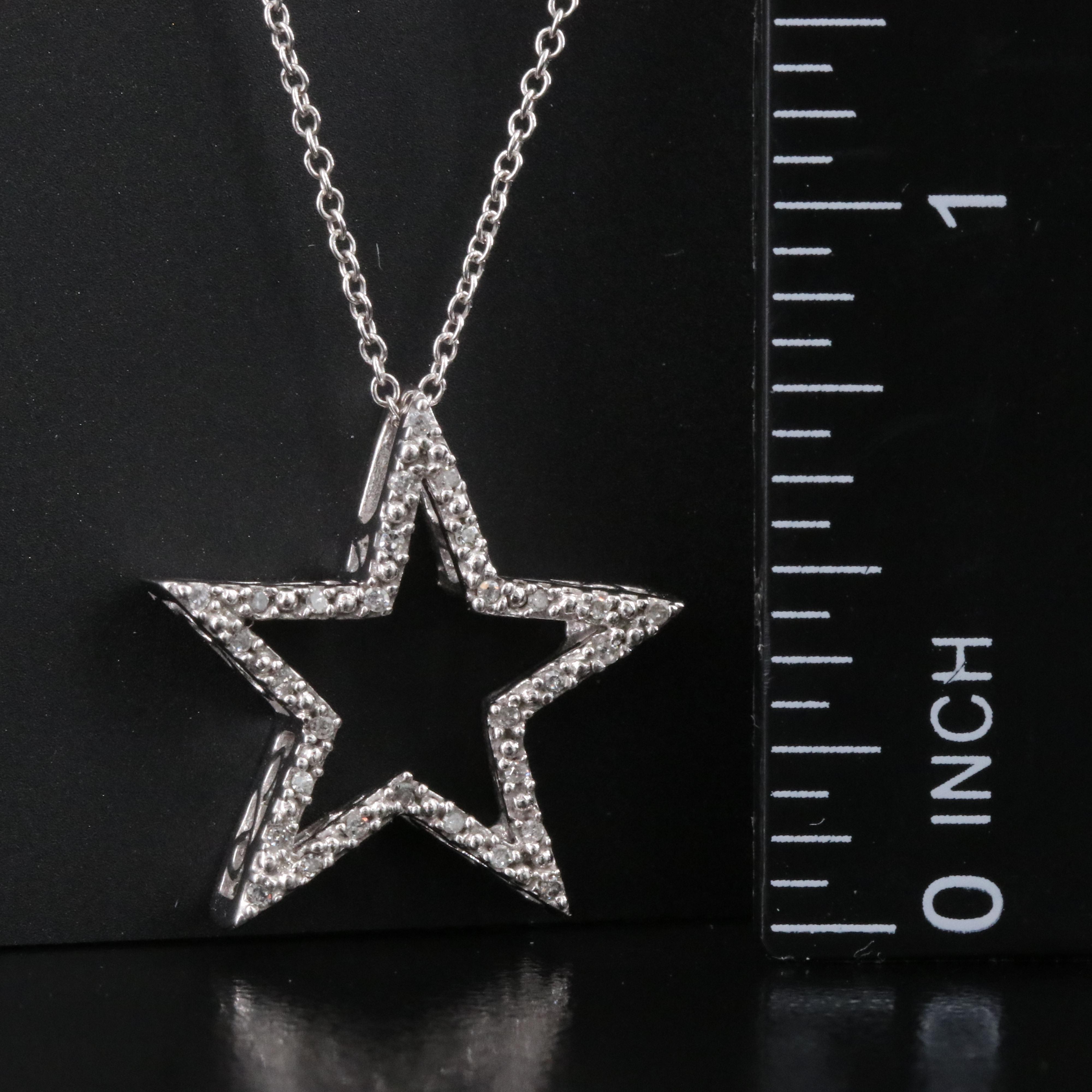 10K 0.11 CTW Diamond Star Pendant on 14K Chain Necklace
