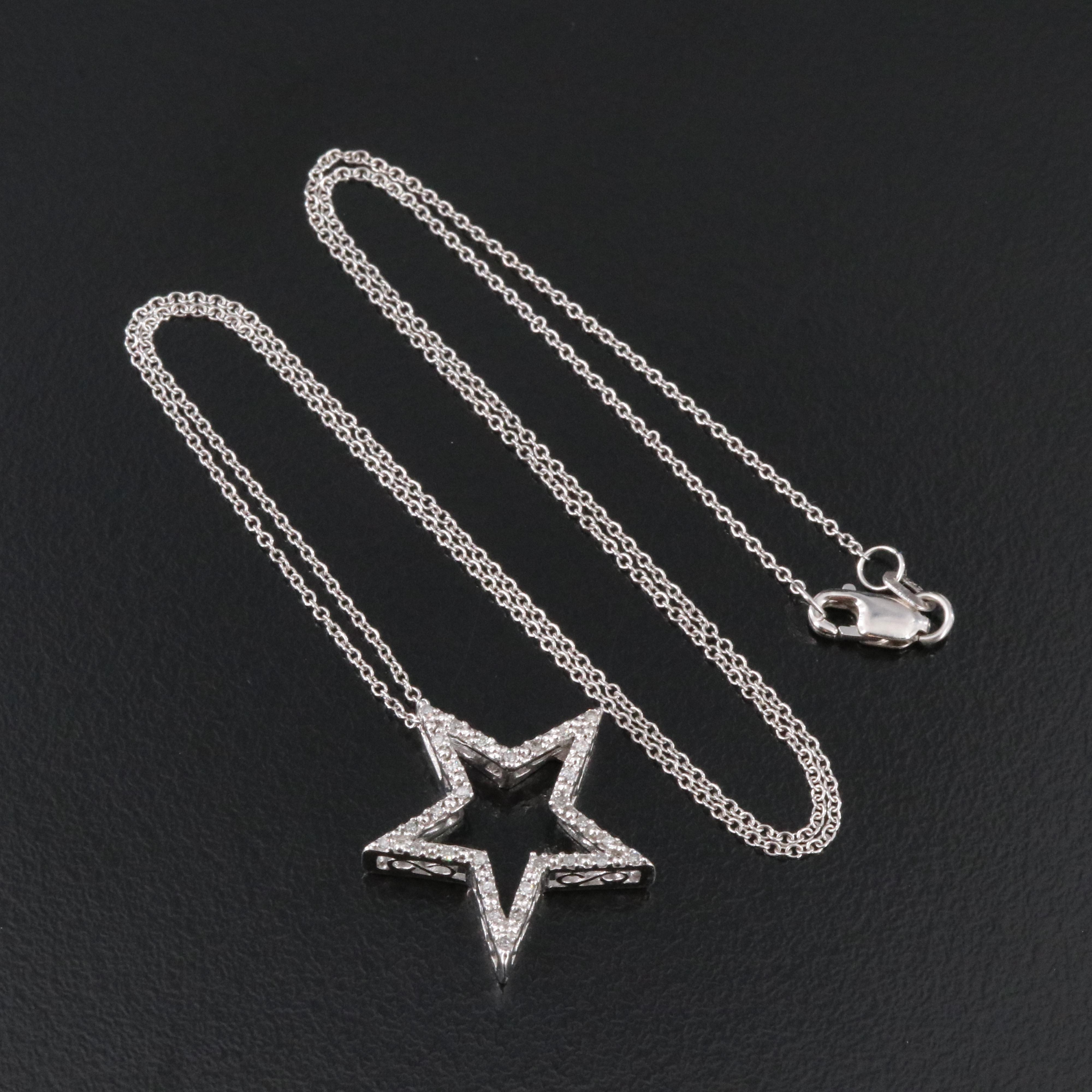 10K 0.11 CTW Diamond Star Pendant on 14K Chain Necklace