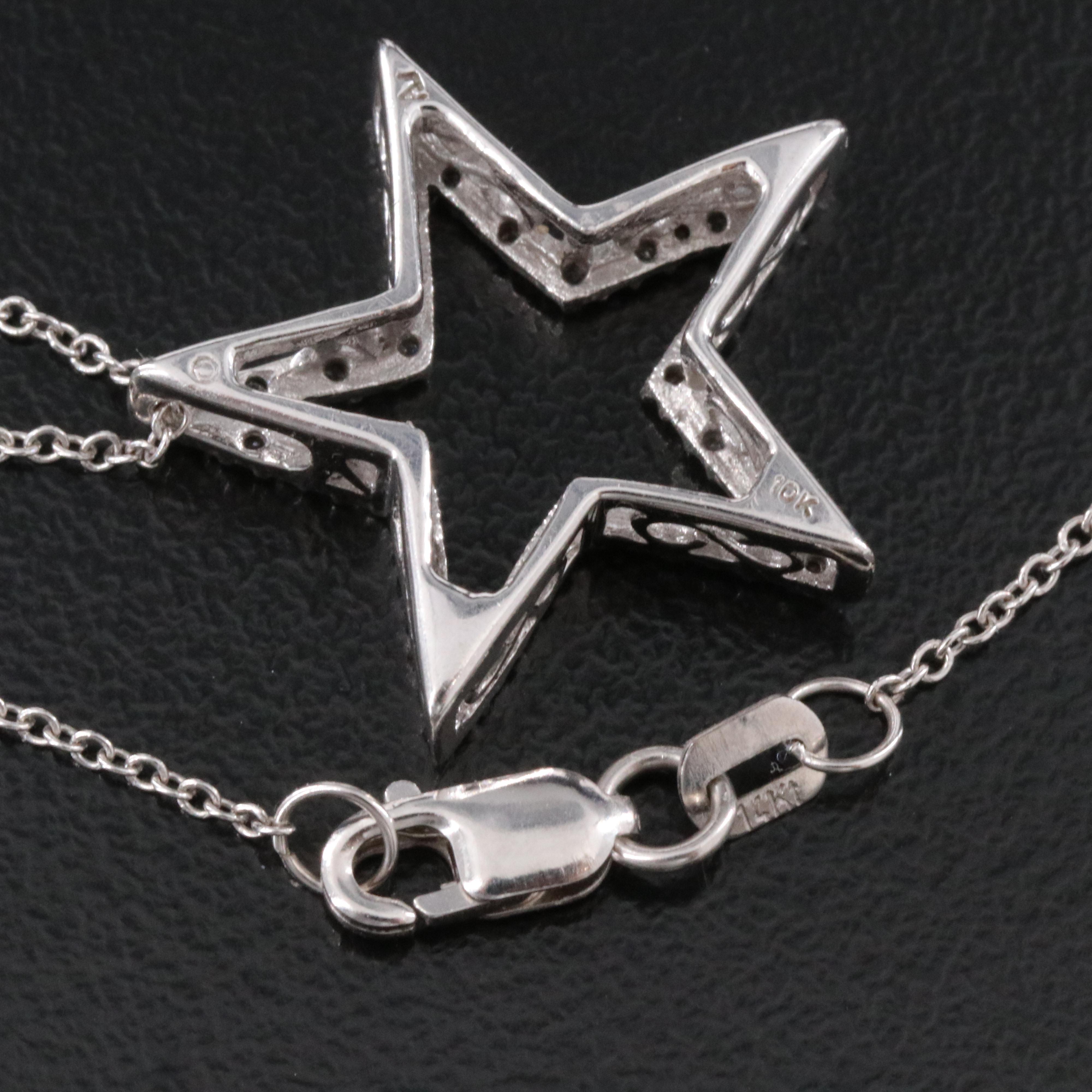 10K 0.11 CTW Diamond Star Pendant on 14K Chain Necklace
