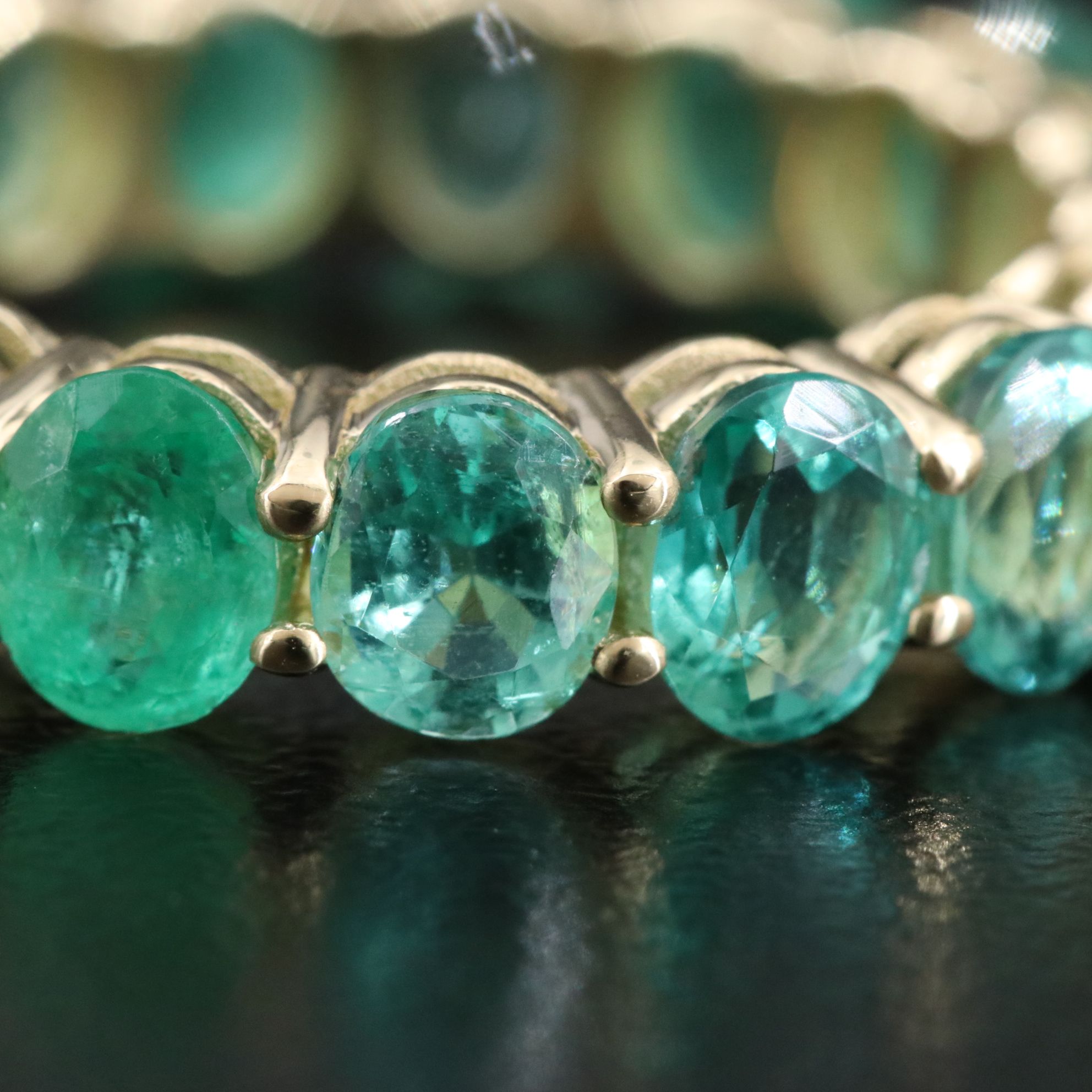 14K Emerald Eternity Band with IGI Jewelry Report