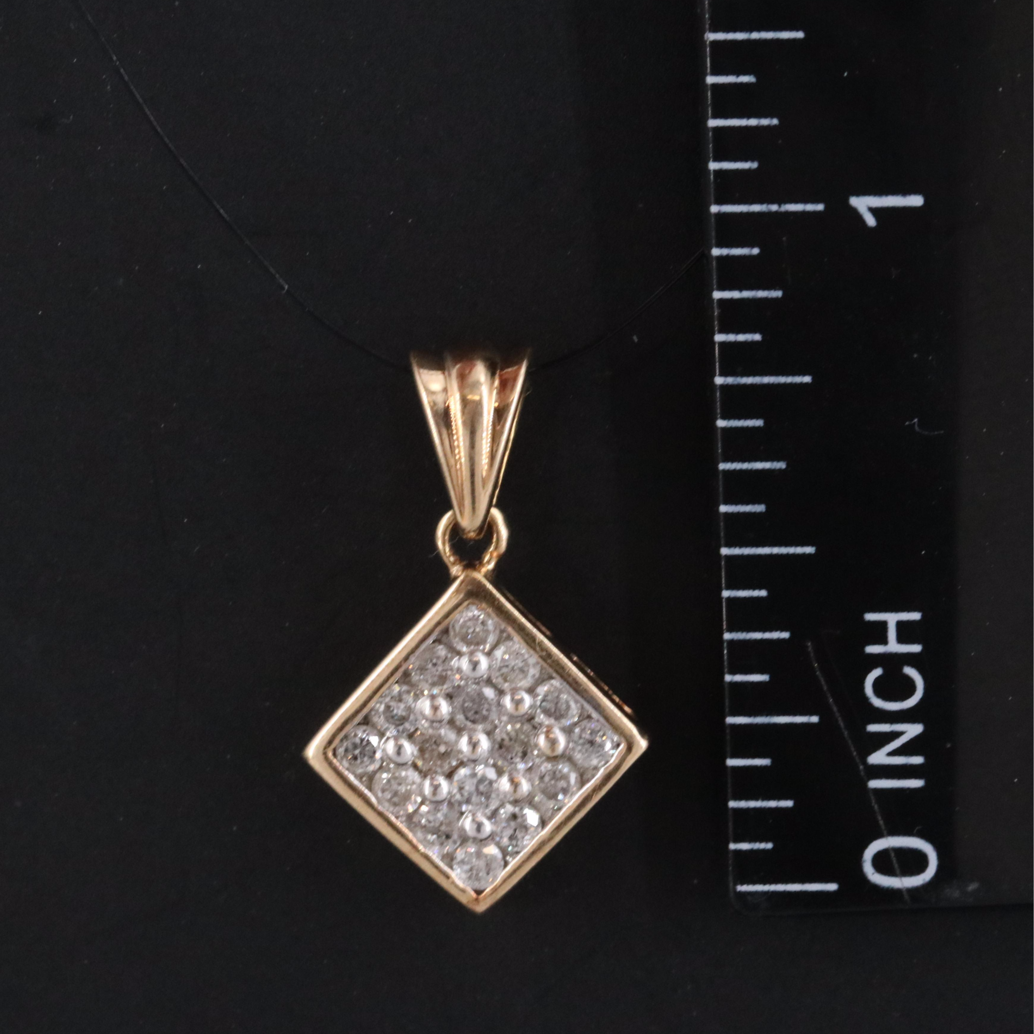 10K 0.46 CTW Diamond Pendant