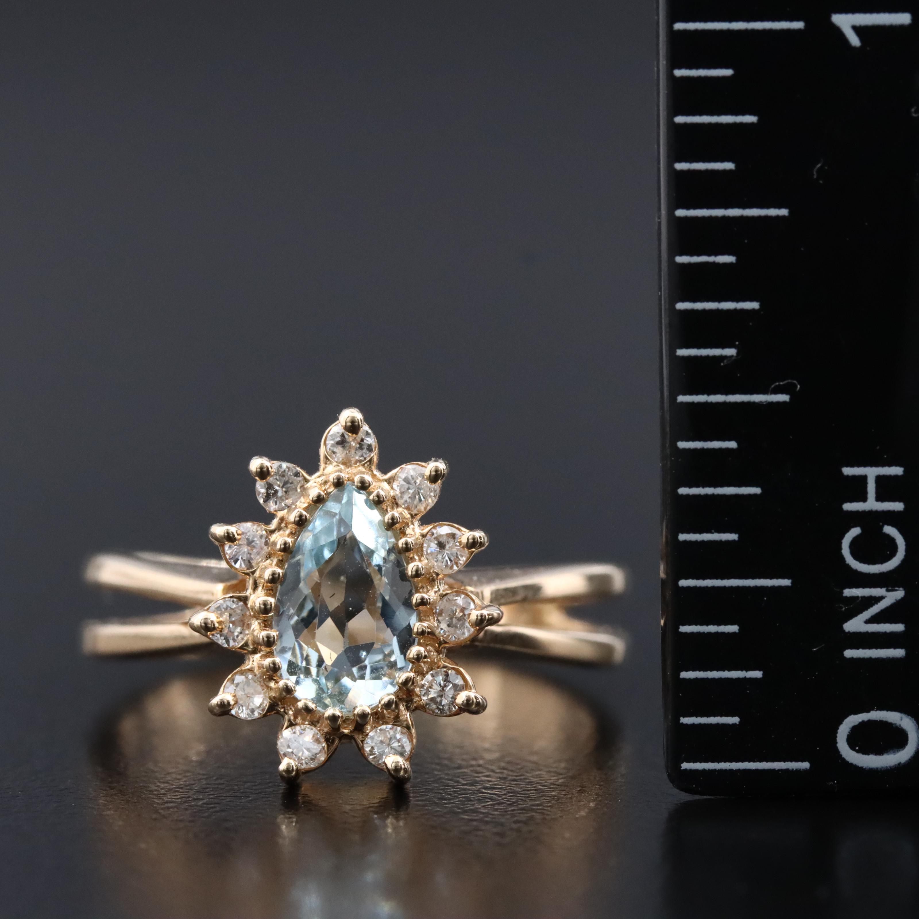 14K Aquamarine and Diamond Halo Ring