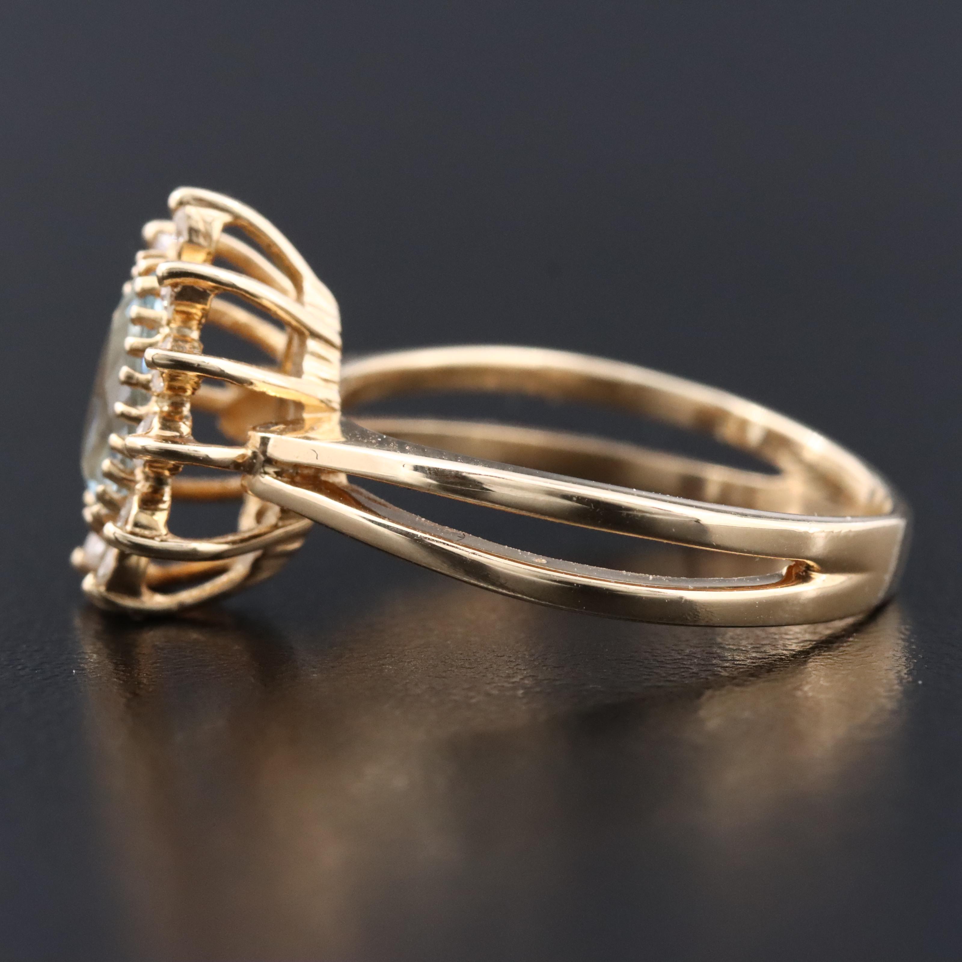 14K Aquamarine and Diamond Halo Ring