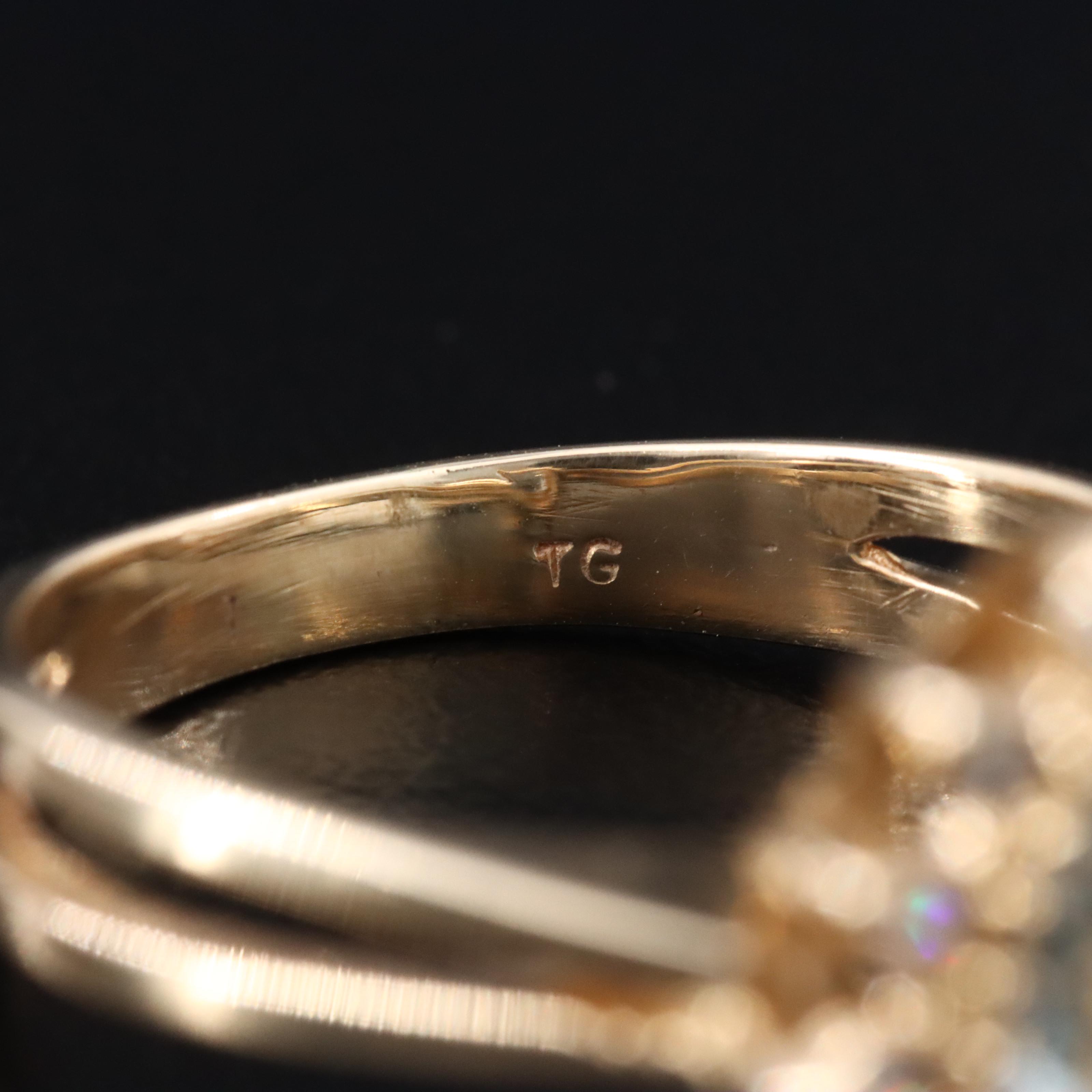 14K Aquamarine and Diamond Halo Ring