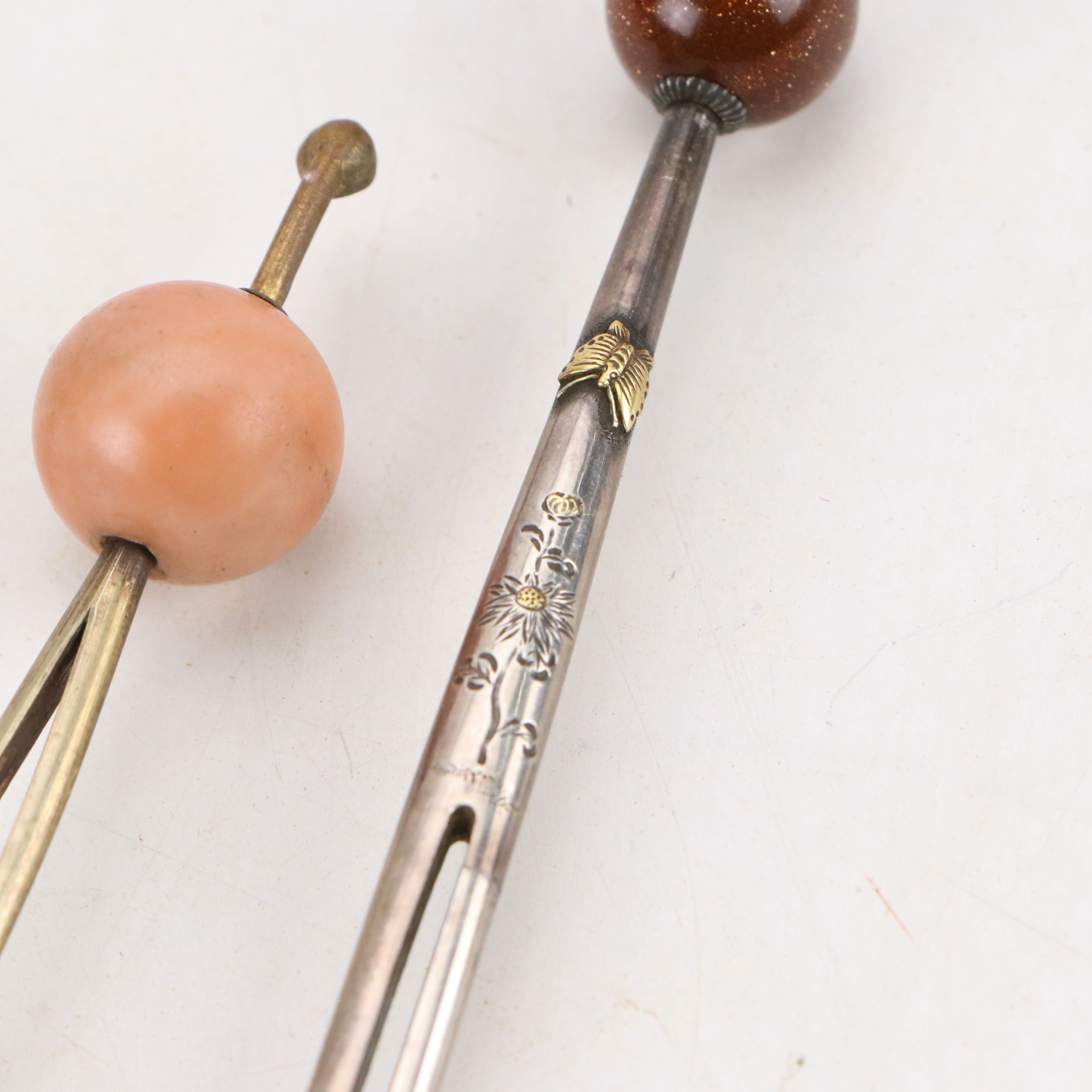 Chinese Sterling and Plate Pins, Embellished with Coral and Goldstone Glass