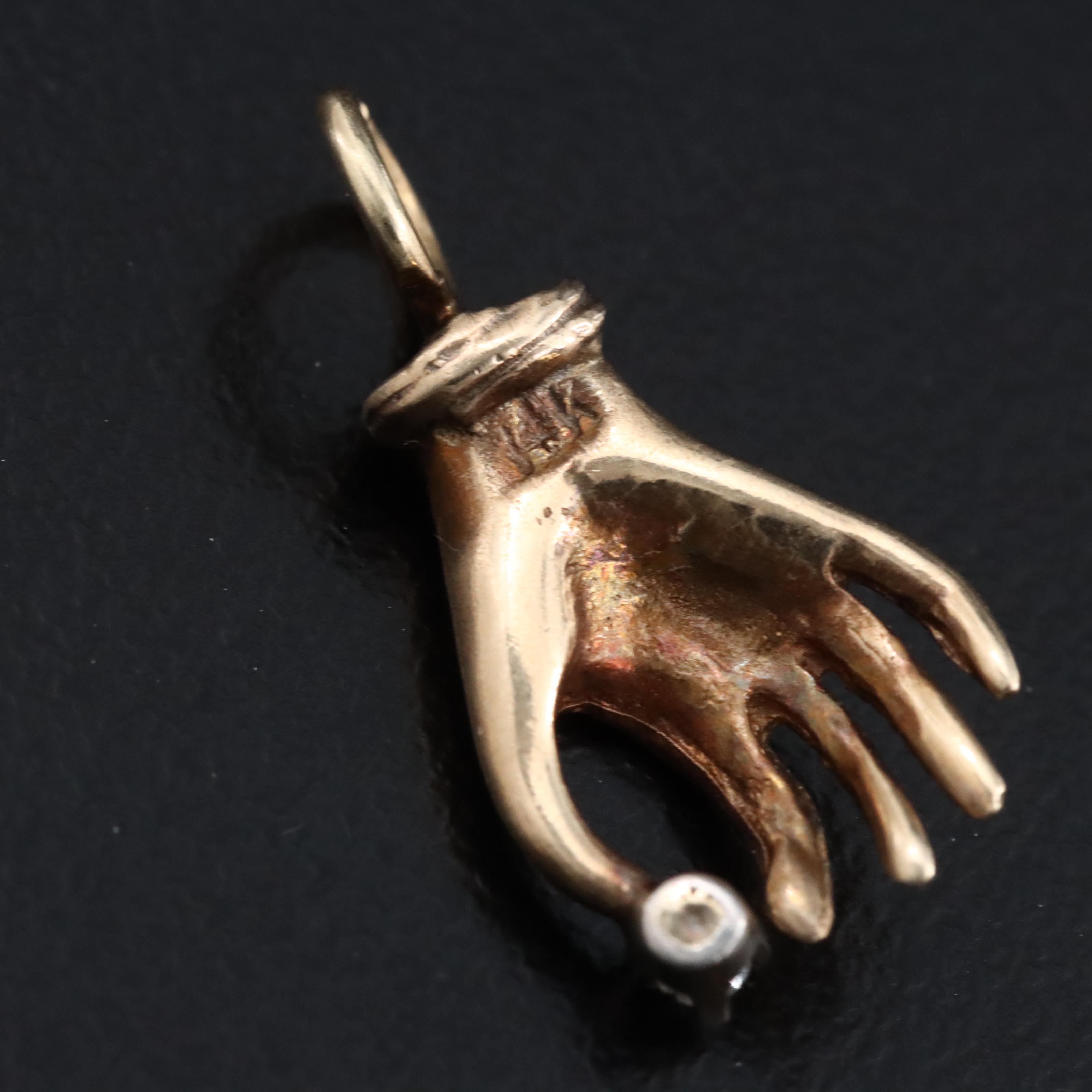 14K 0.03 CT Diamond Hand Pendant