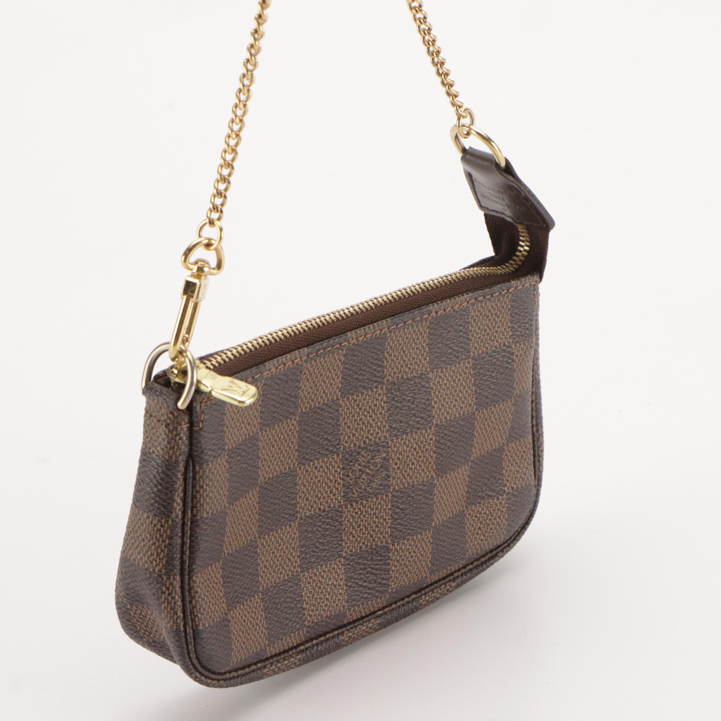 Louis Vuitton Mini Pochette Accessoires in Damier Ebene Canvas