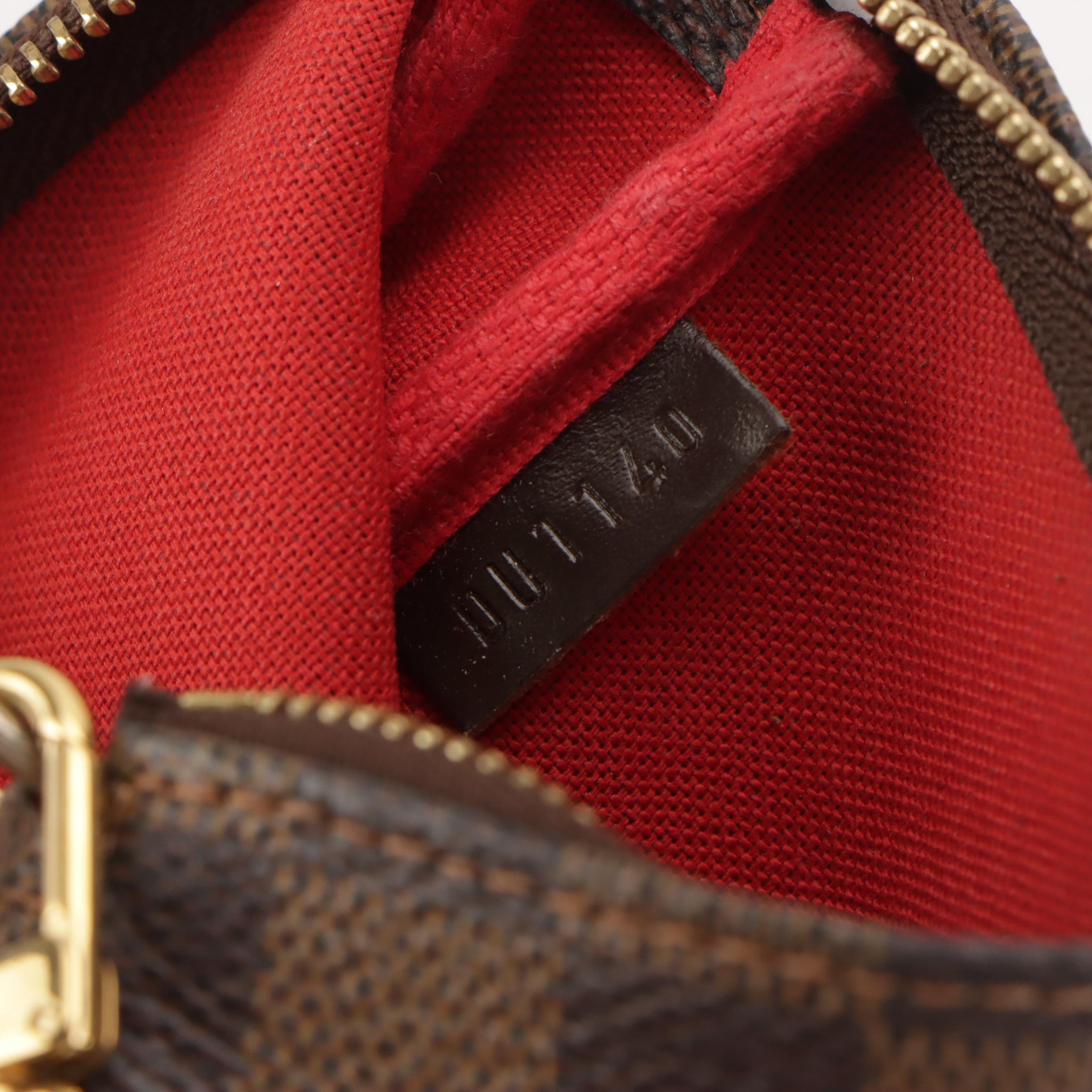 Louis Vuitton Mini Pochette Accessoires in Damier Ebene Canvas