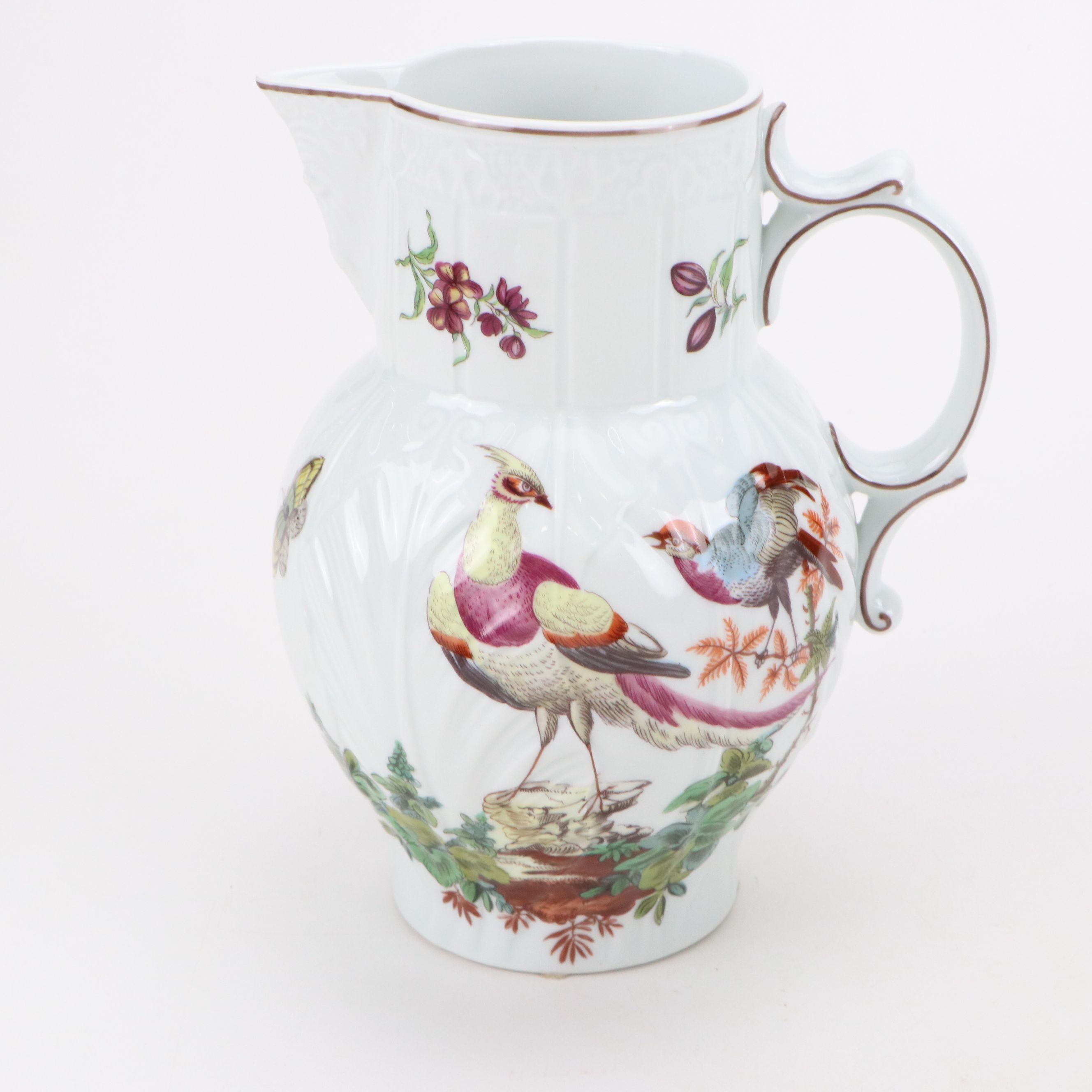 Pair of Mottahedeh "Chelsea Birds" Porcelain Pitchers