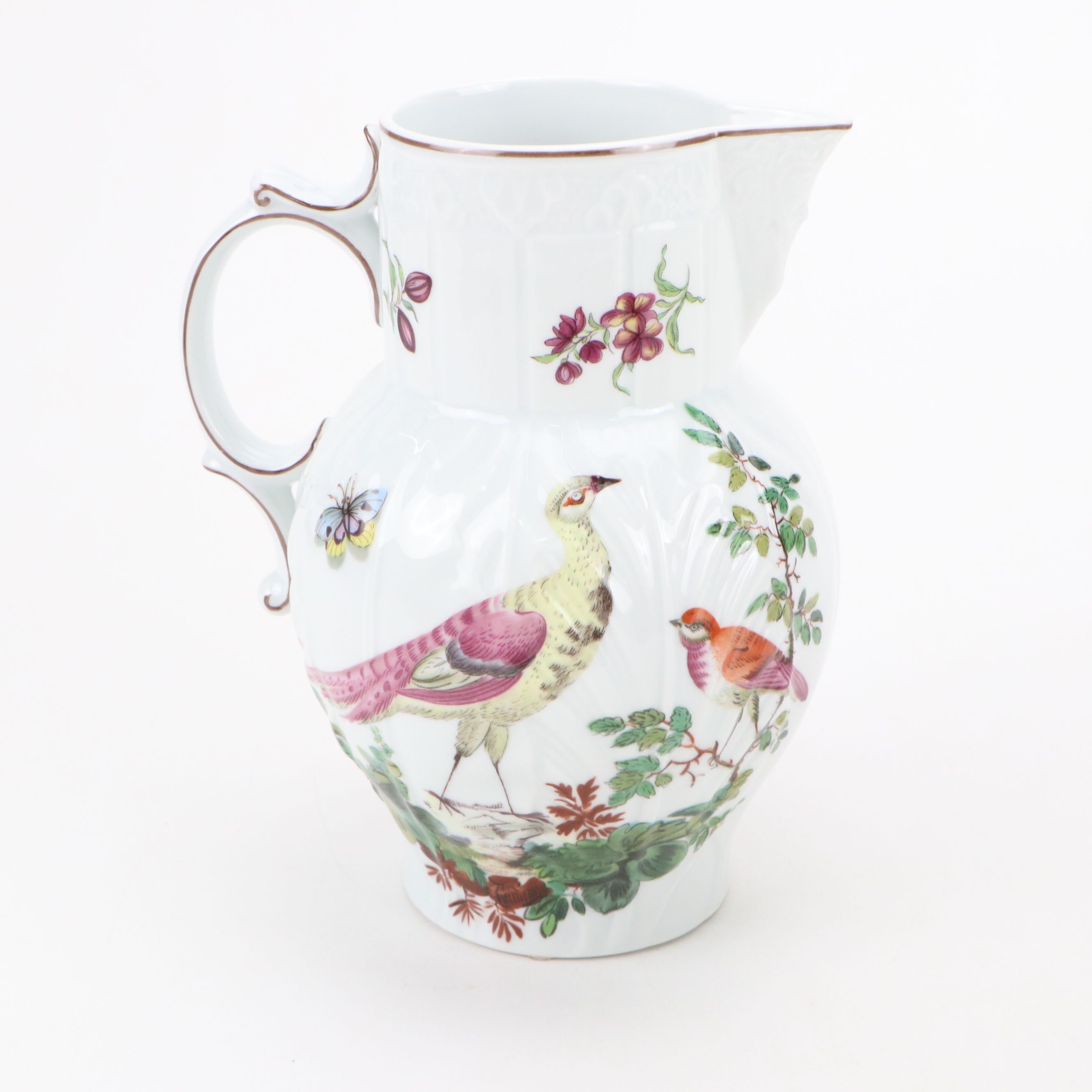 Pair of Mottahedeh "Chelsea Birds" Porcelain Pitchers