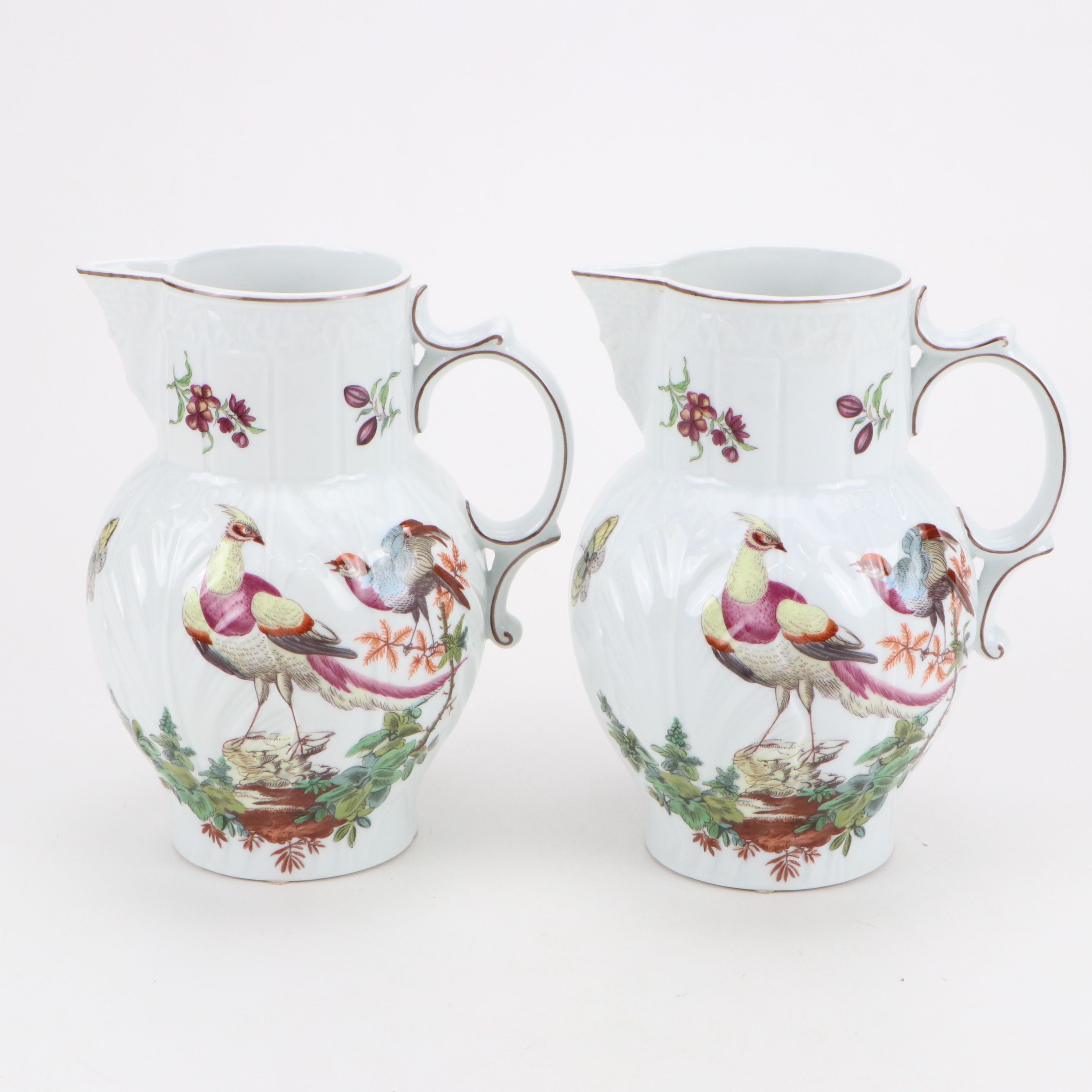 Pair of Mottahedeh "Chelsea Birds" Porcelain Pitchers
