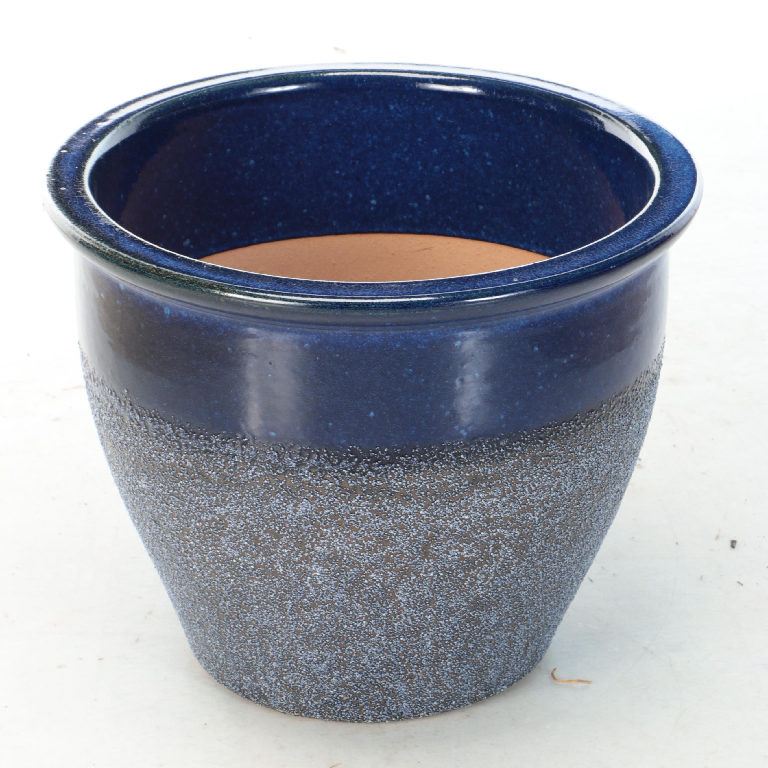 Glazed Ceramic Planter, Wrought Iron Side Table, and Metal Plant Stands