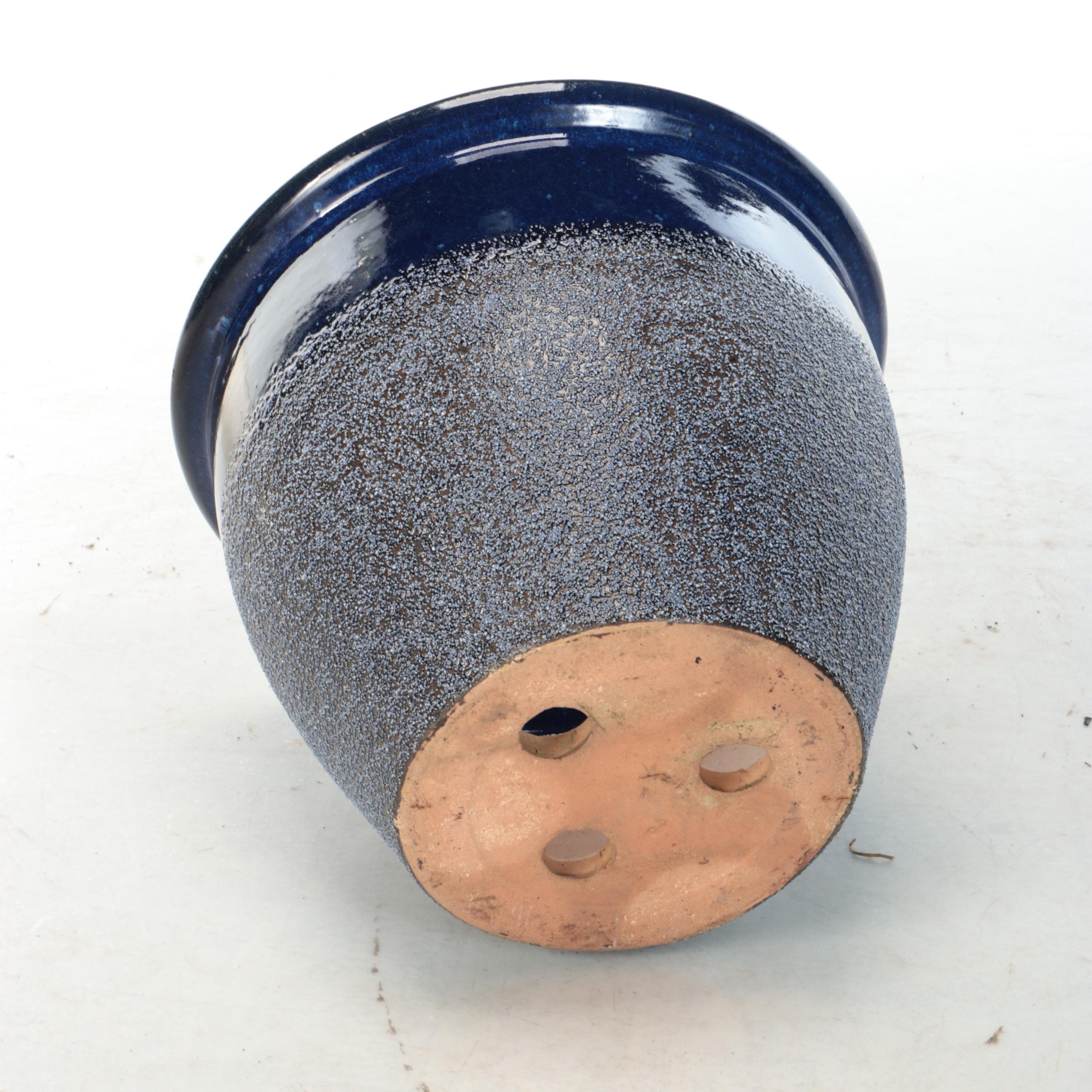 Glazed Ceramic Planter, Wrought Iron Side Table, and Metal Plant Stands