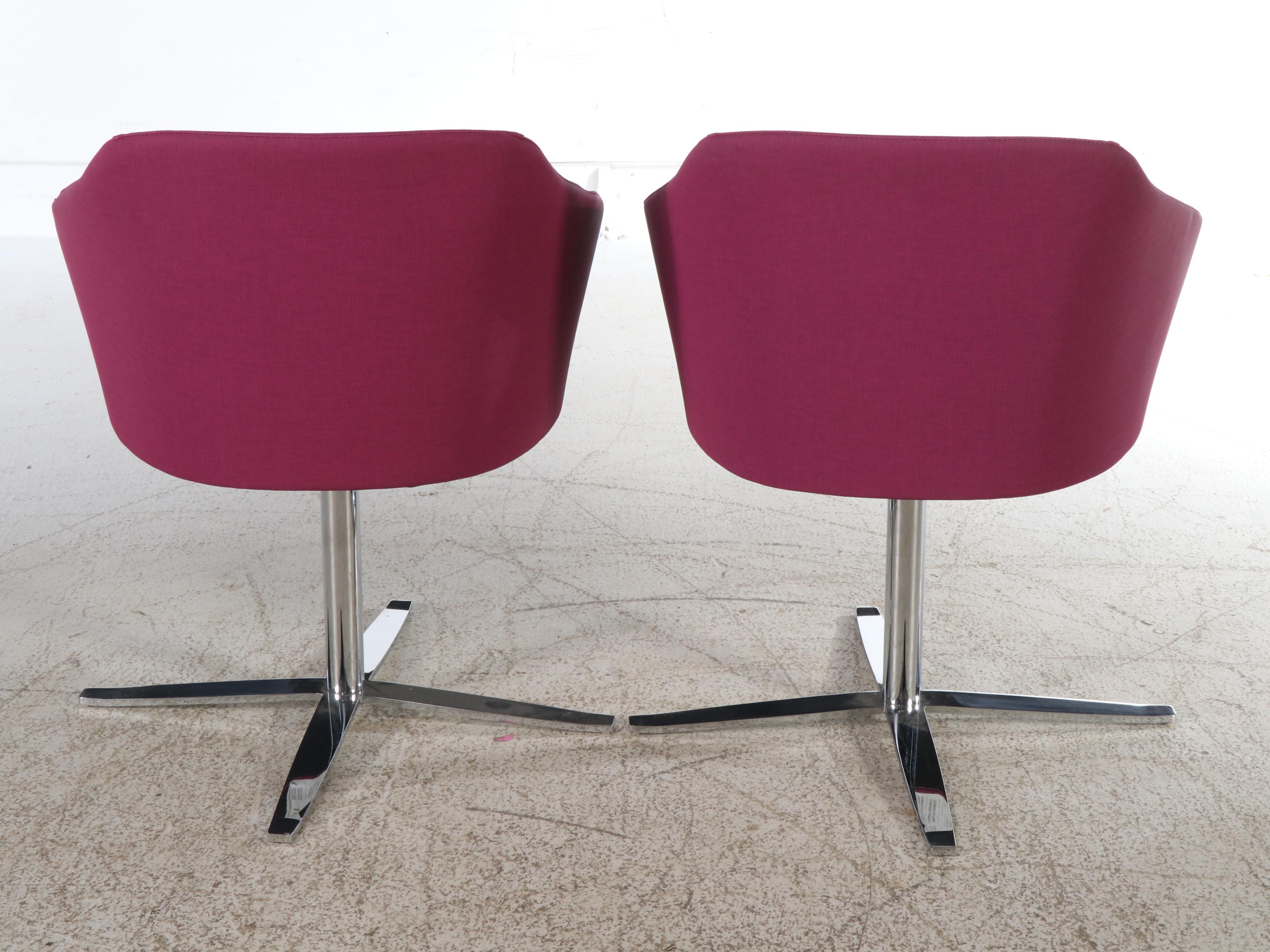 Pair of Global Upholstery Modernist Magenta Swivel Chairs