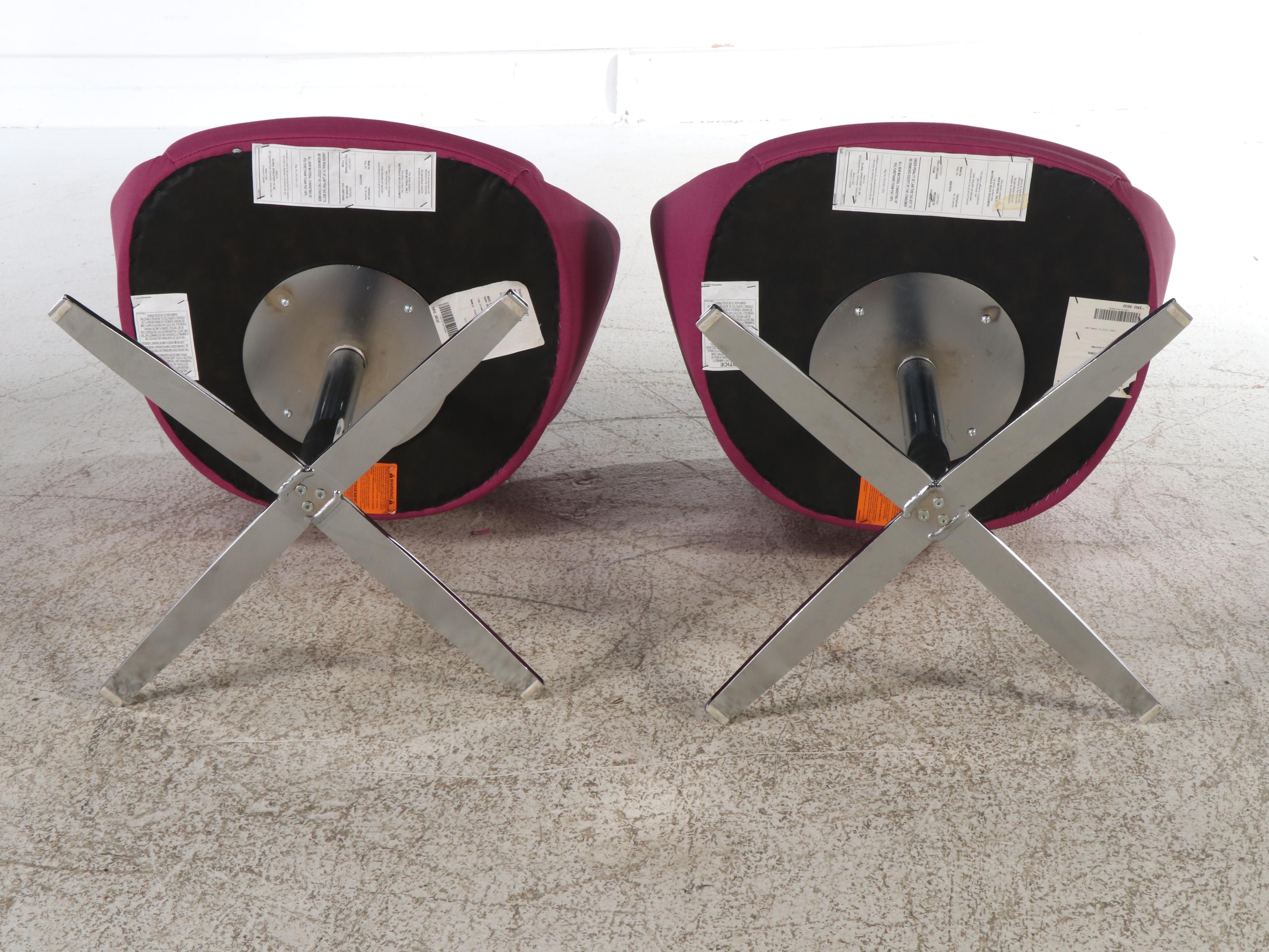 Pair of Global Upholstery Modernist Magenta Swivel Chairs
