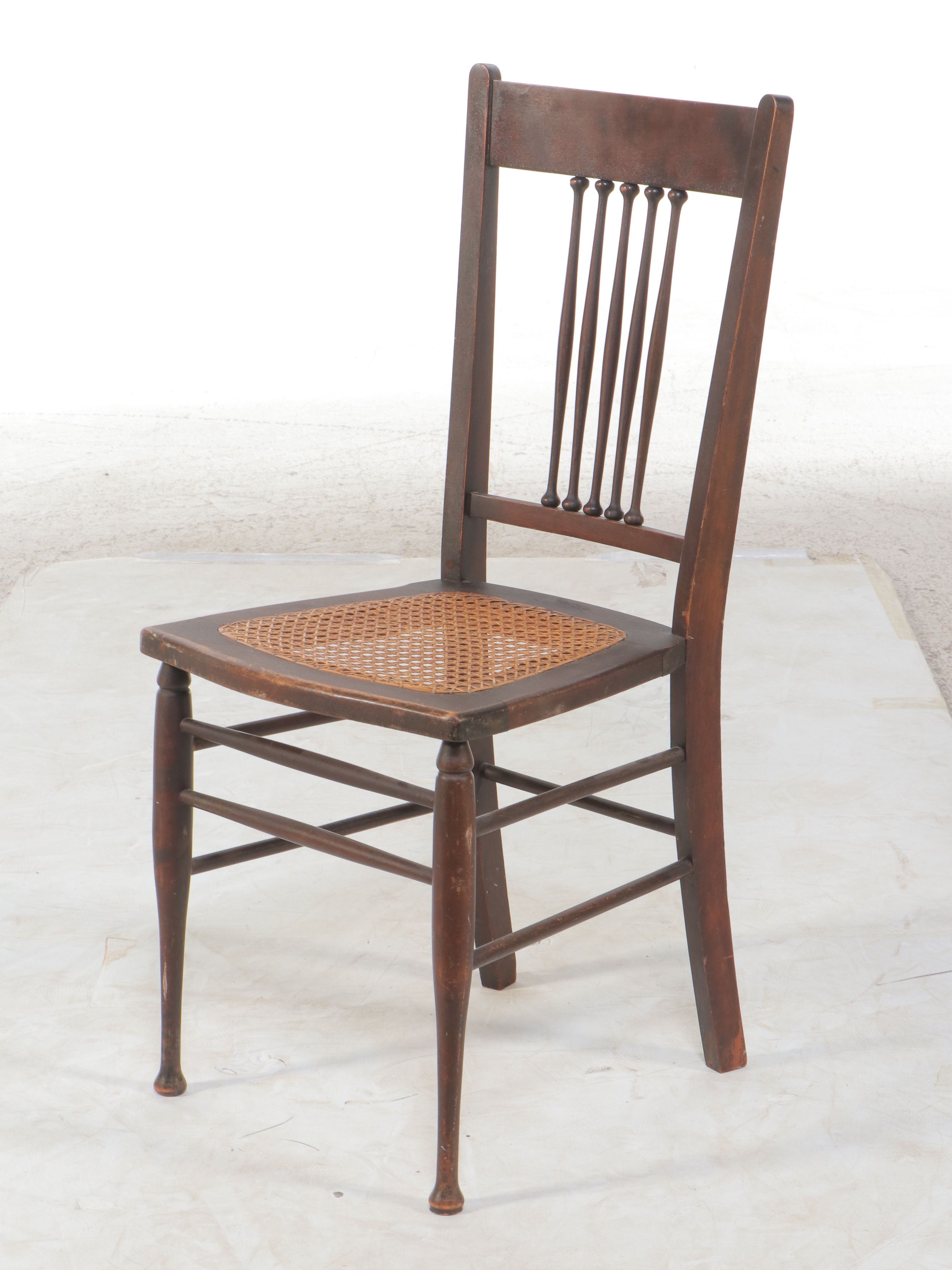 Pair of Edwardian Style Spindle Back Walnut Finish Cane Bottom Chairs