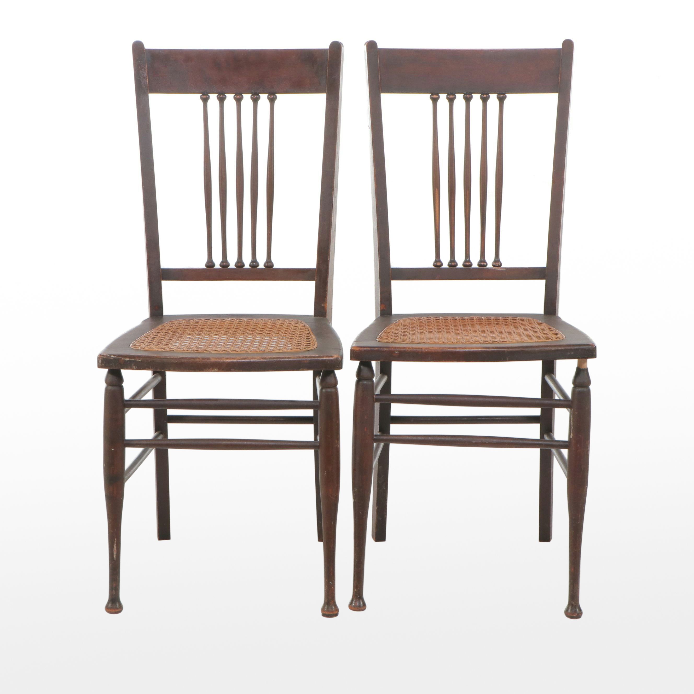 Pair of Edwardian Style Spindle Back Walnut Finish Cane Bottom Chairs