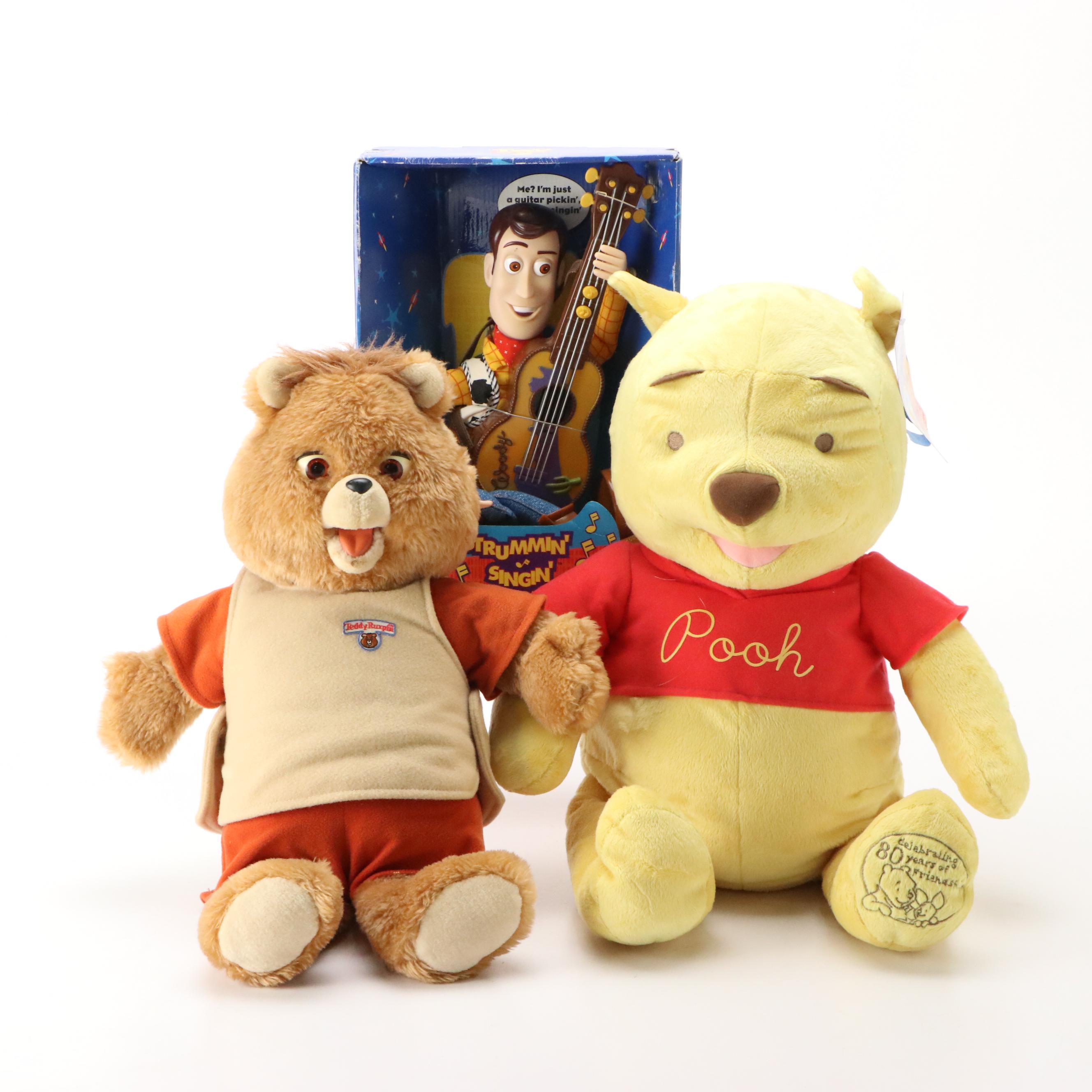 Toy Story 2 Strummin' Singin' Woody, Winnie the Pooh Bear, and Teddy Ruxpin