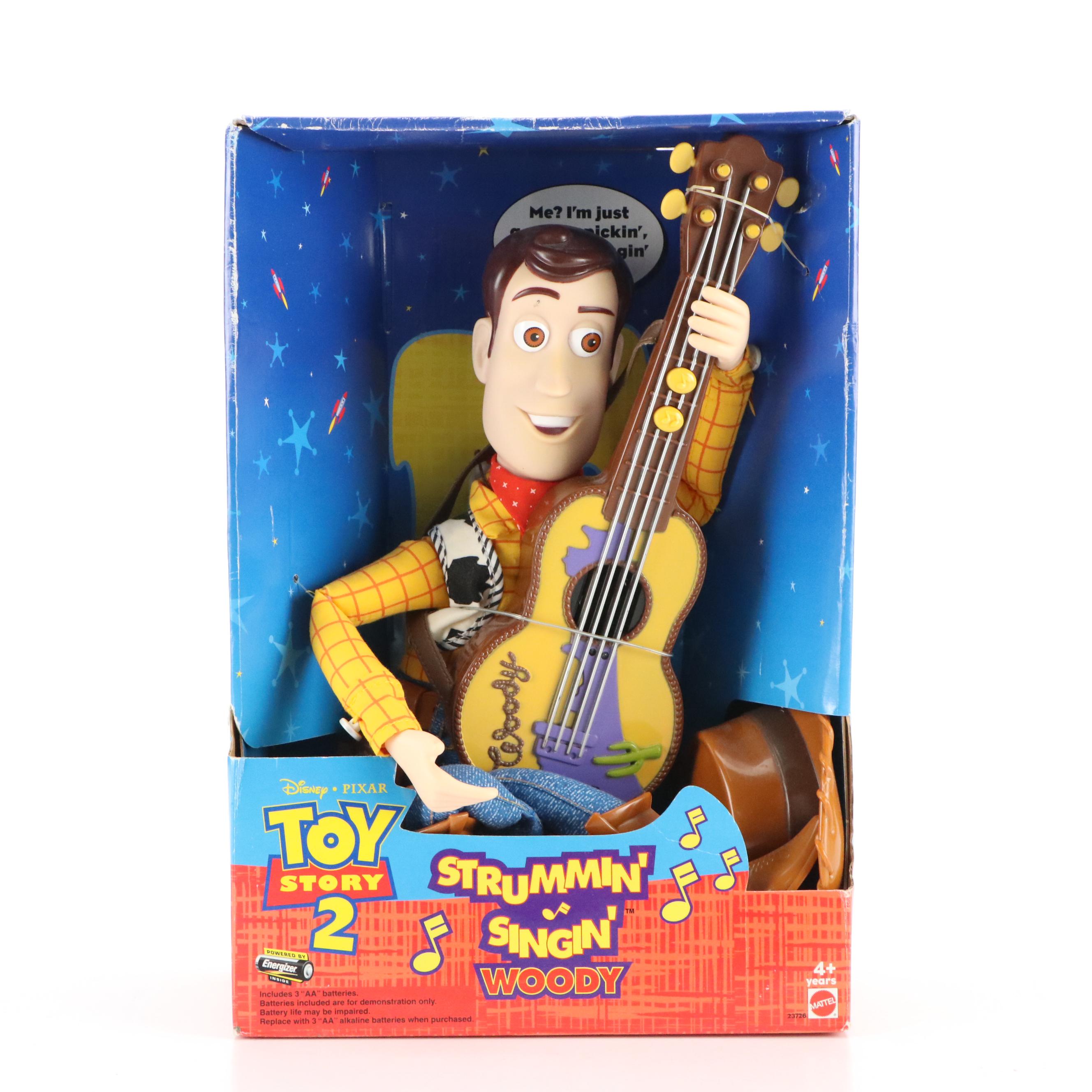Toy Story 2 Strummin' Singin' Woody, Winnie the Pooh Bear, and Teddy Ruxpin