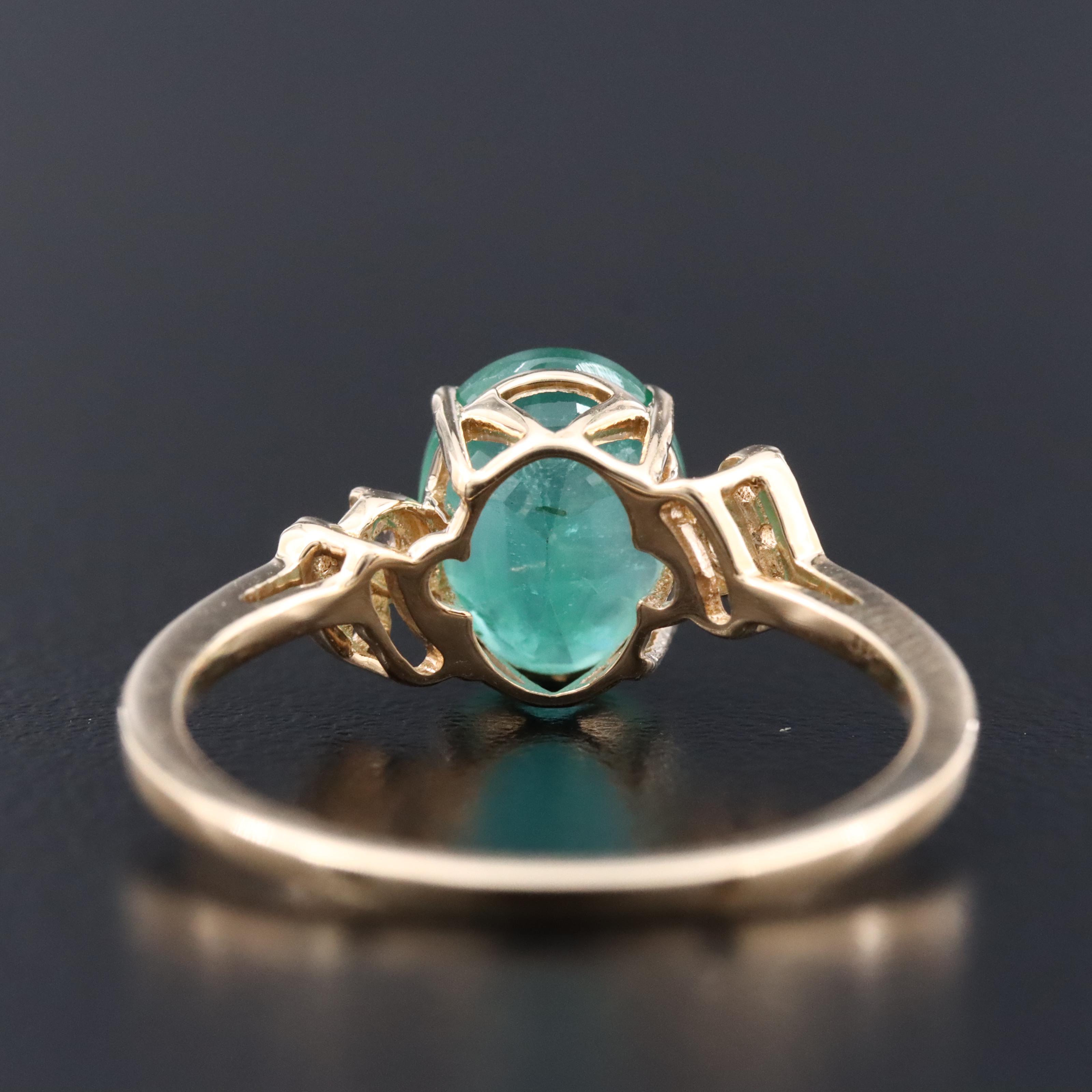 14K 1.62 CT Emerald and White Sapphire Ring